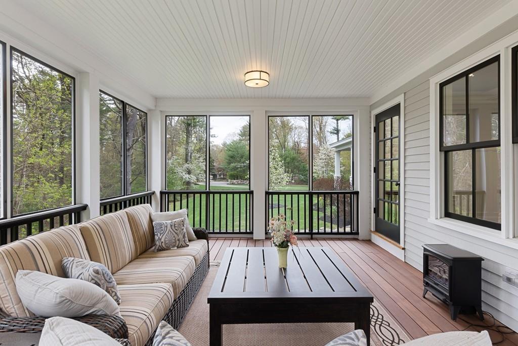 88 Hugh Cargill Road Concord, MA 01742 - Photo 33 of 36 a balcony with furniture and large windows