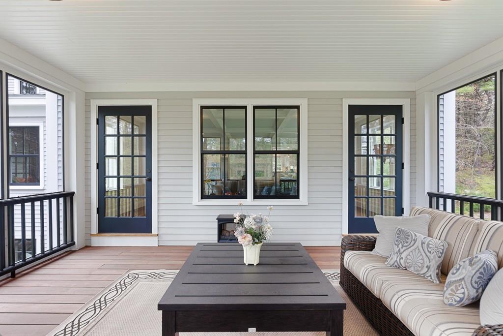 88 Hugh Cargill Road Concord, MA 01742 - Photo 34 of 36 a living room with furniture and windows