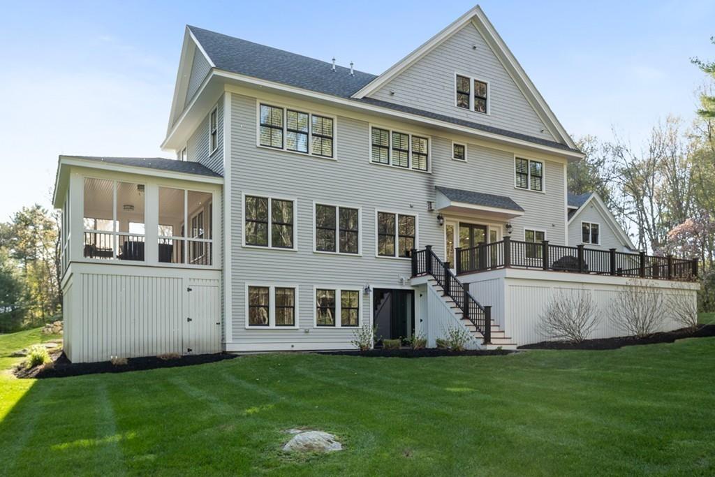 88 Hugh Cargill Road Concord, MA 01742 - Photo 35 of 36 a view of a house with a yard