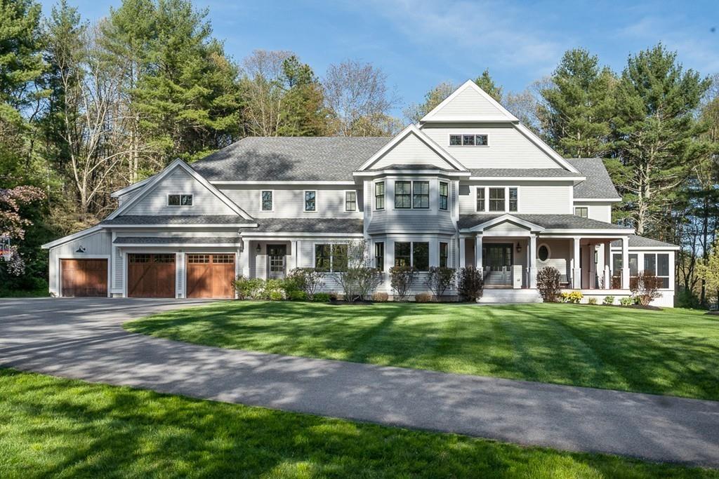 88 Hugh Cargill Road Concord, MA 01742 - Photo 36 of 36 a front view of a house with a garden