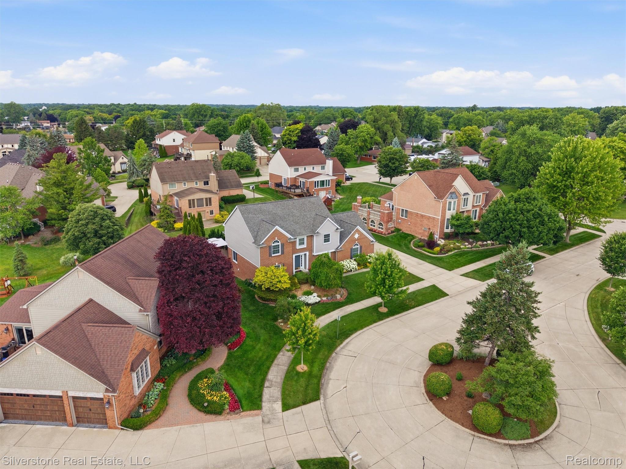 6577 Edith Court Troy, MI 48085 - Photo 61 of 61 Cul-de-sac setting featuring a landscaped island and mature street trees