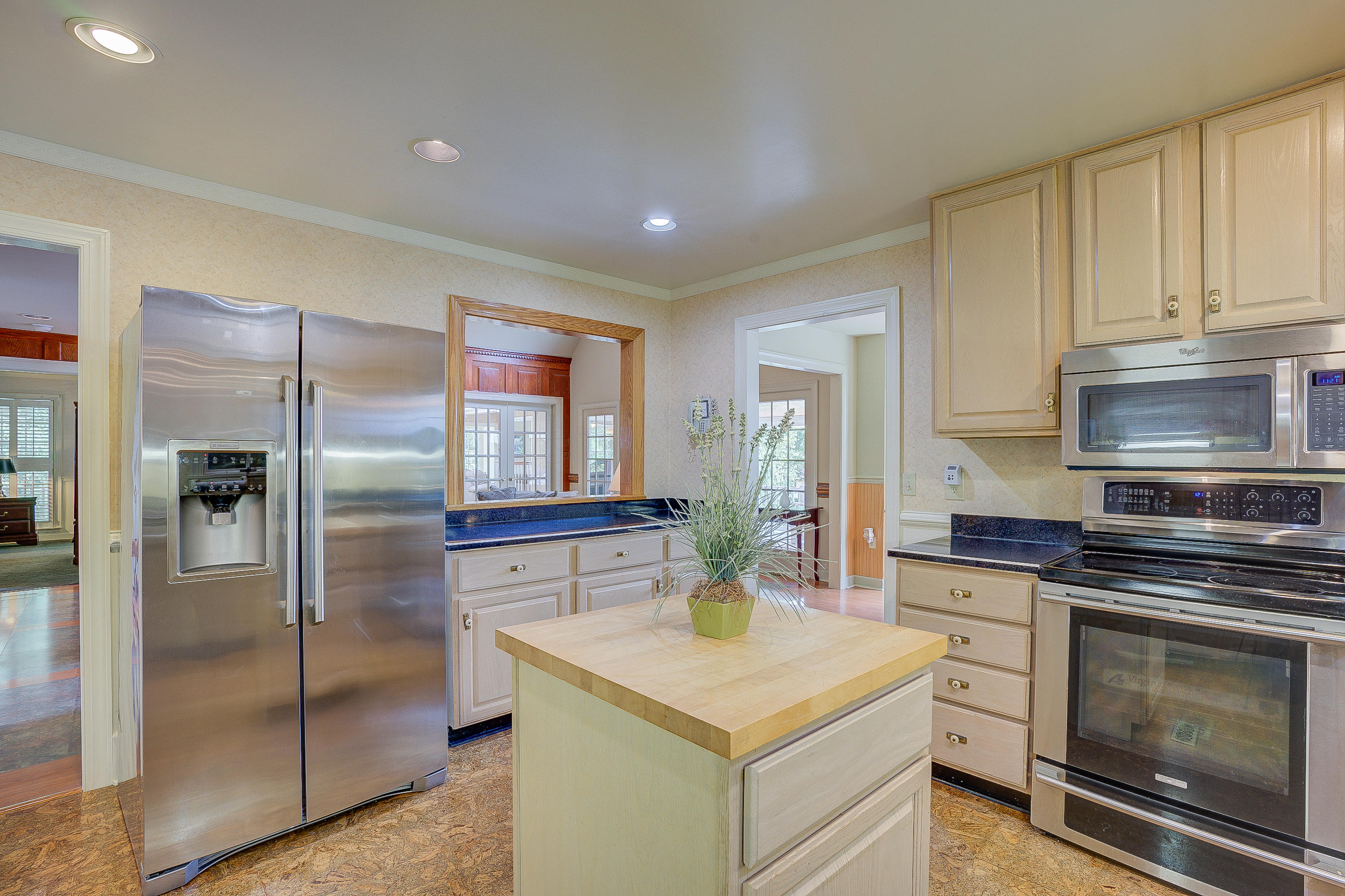 105 River Road North Covington, VA 24426 - Photo 15 of 77 a kitchen with stainless steel appliances granite countertop a refrigerator a stove and a sink