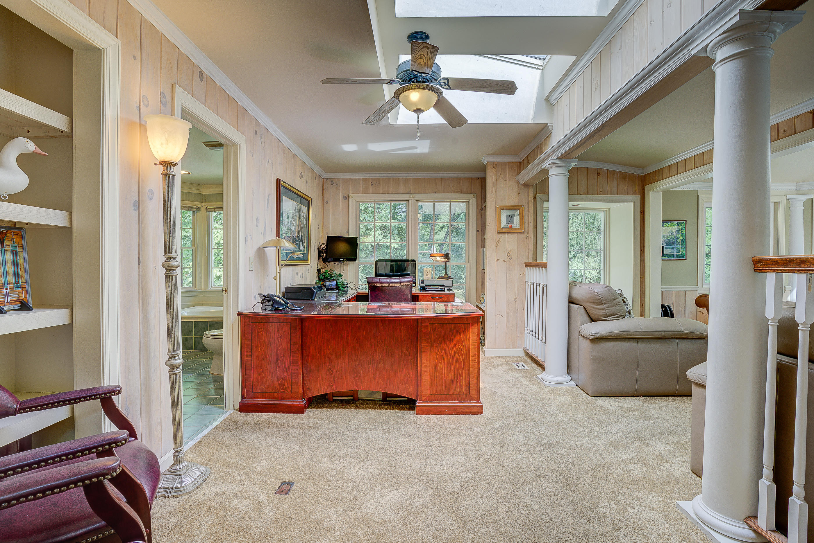 105 River Road North Covington, VA 24426 - Photo 23 of 77 a living room with furniture and a chandelier