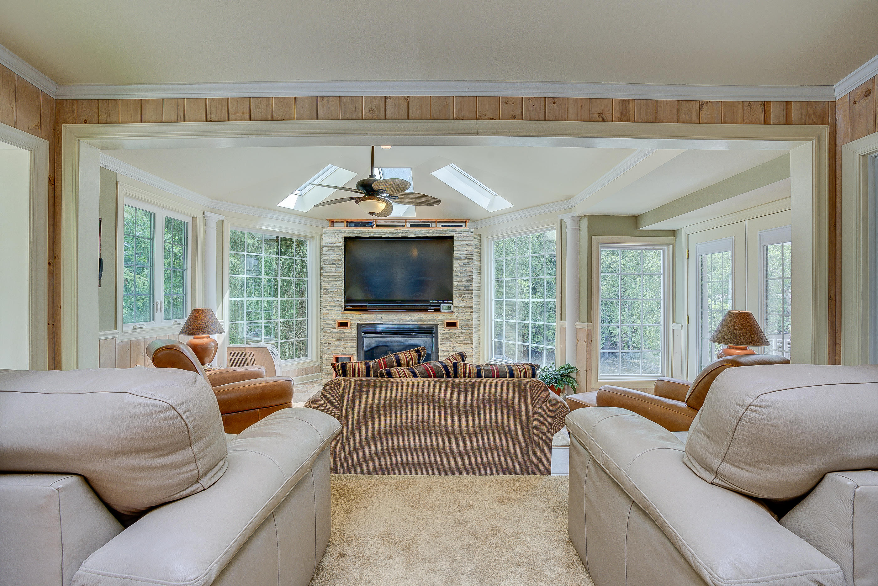 105 River Road North Covington, VA 24426 - Photo 24 of 77 a living room with furniture and a flat screen tv