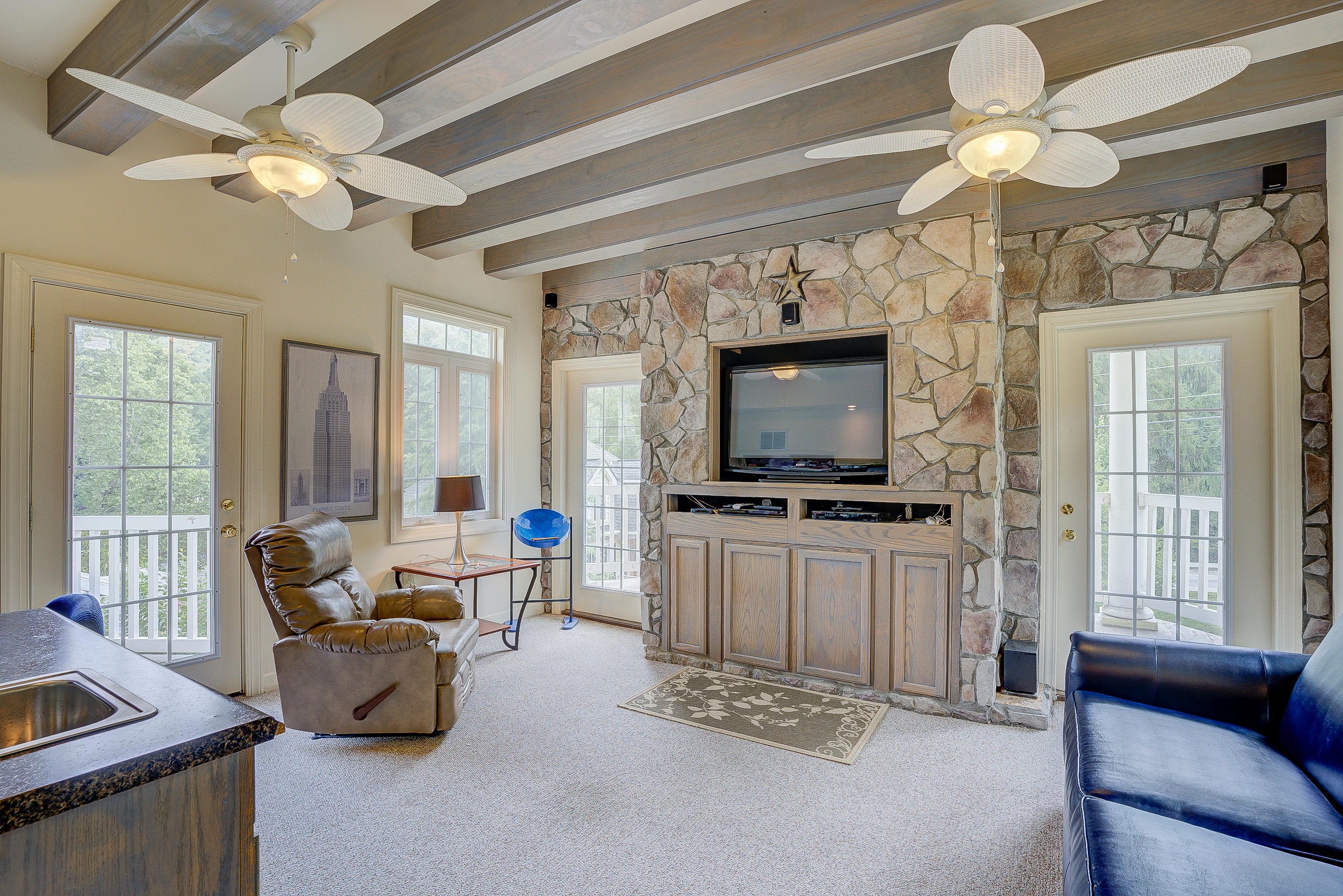 105 River Road North Covington, VA 24426 - Photo 30 of 77 a living room with furniture and a flat screen tv