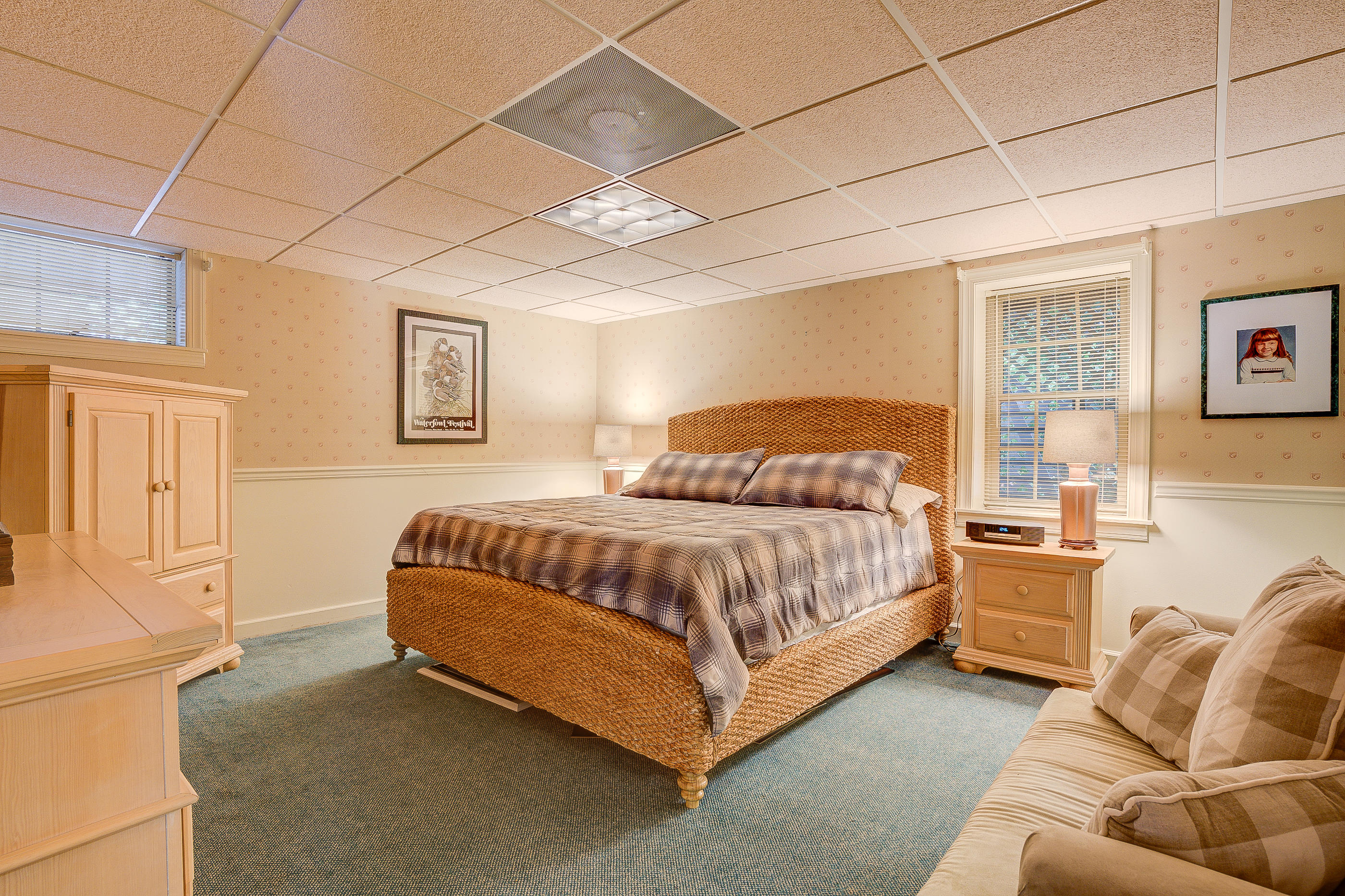 105 River Road North Covington, VA 24426 - Photo 46 of 77 a spacious bedroom with a bed couch and a window