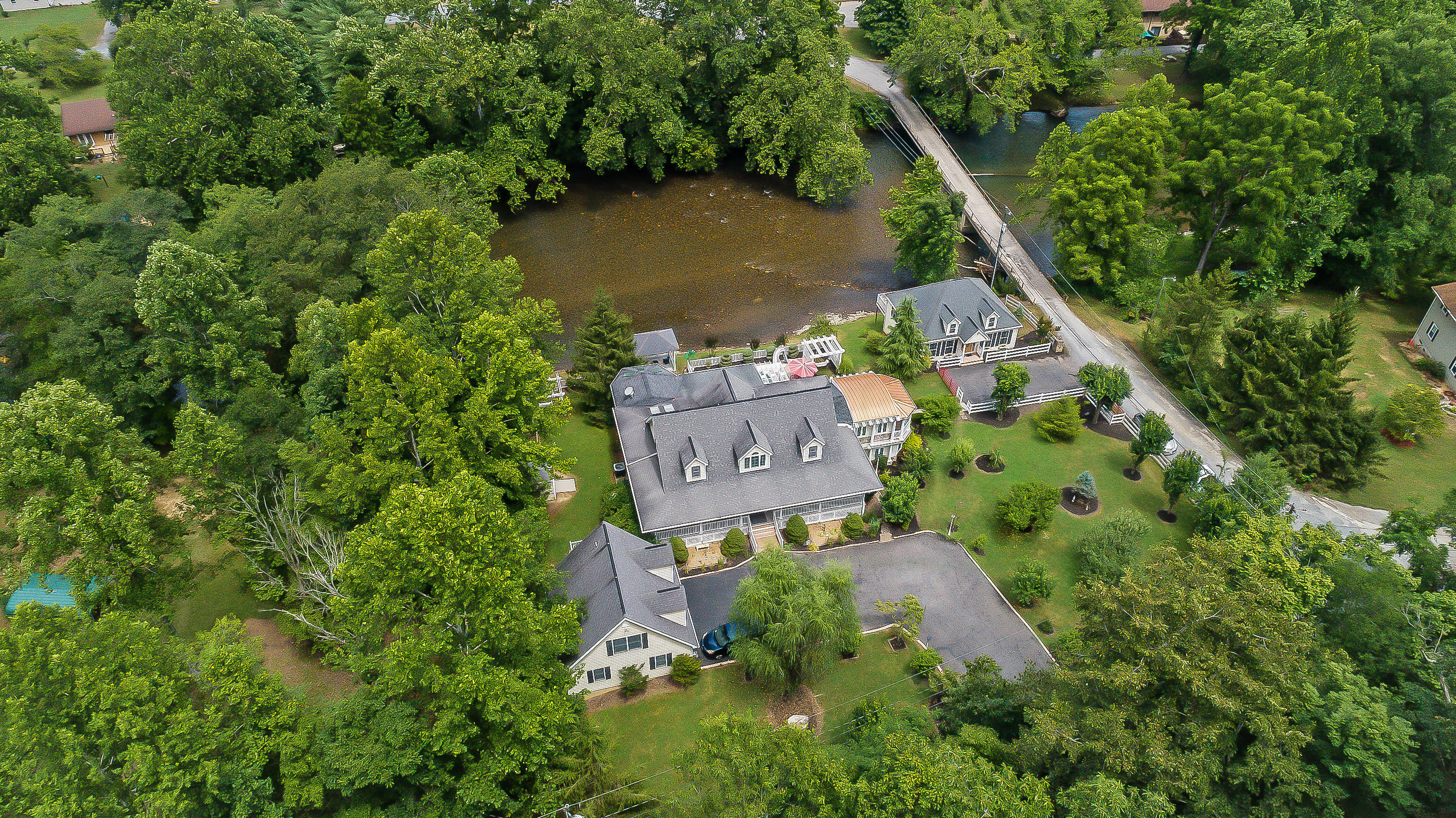 105 River Road North Covington, VA 24426 - Photo 5 of 77 an aerial view of a house with a garden