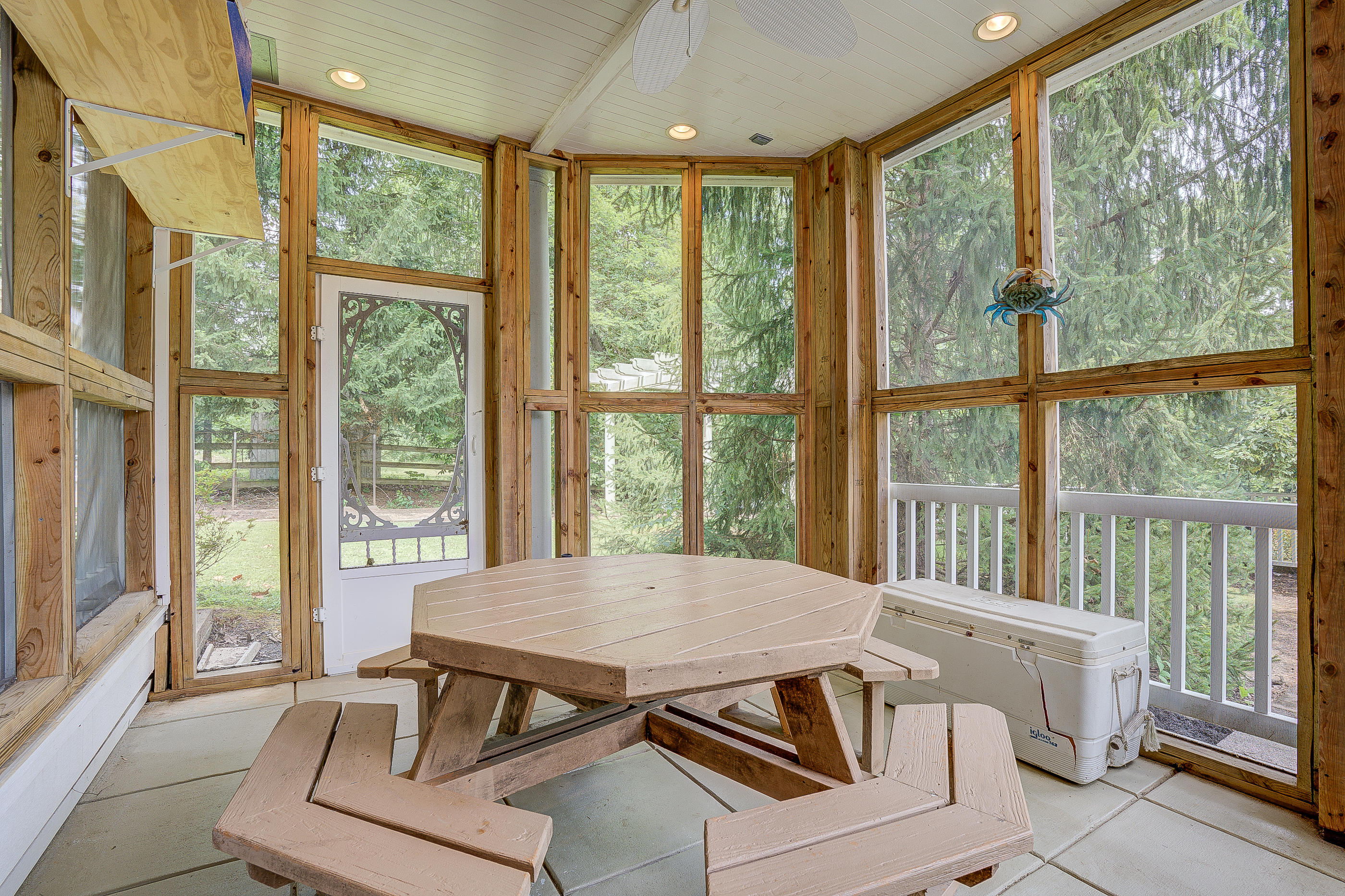 105 River Road North Covington, VA 24426 - Photo 53 of 77 a view of a dining room with furniture large windows and wooden floor