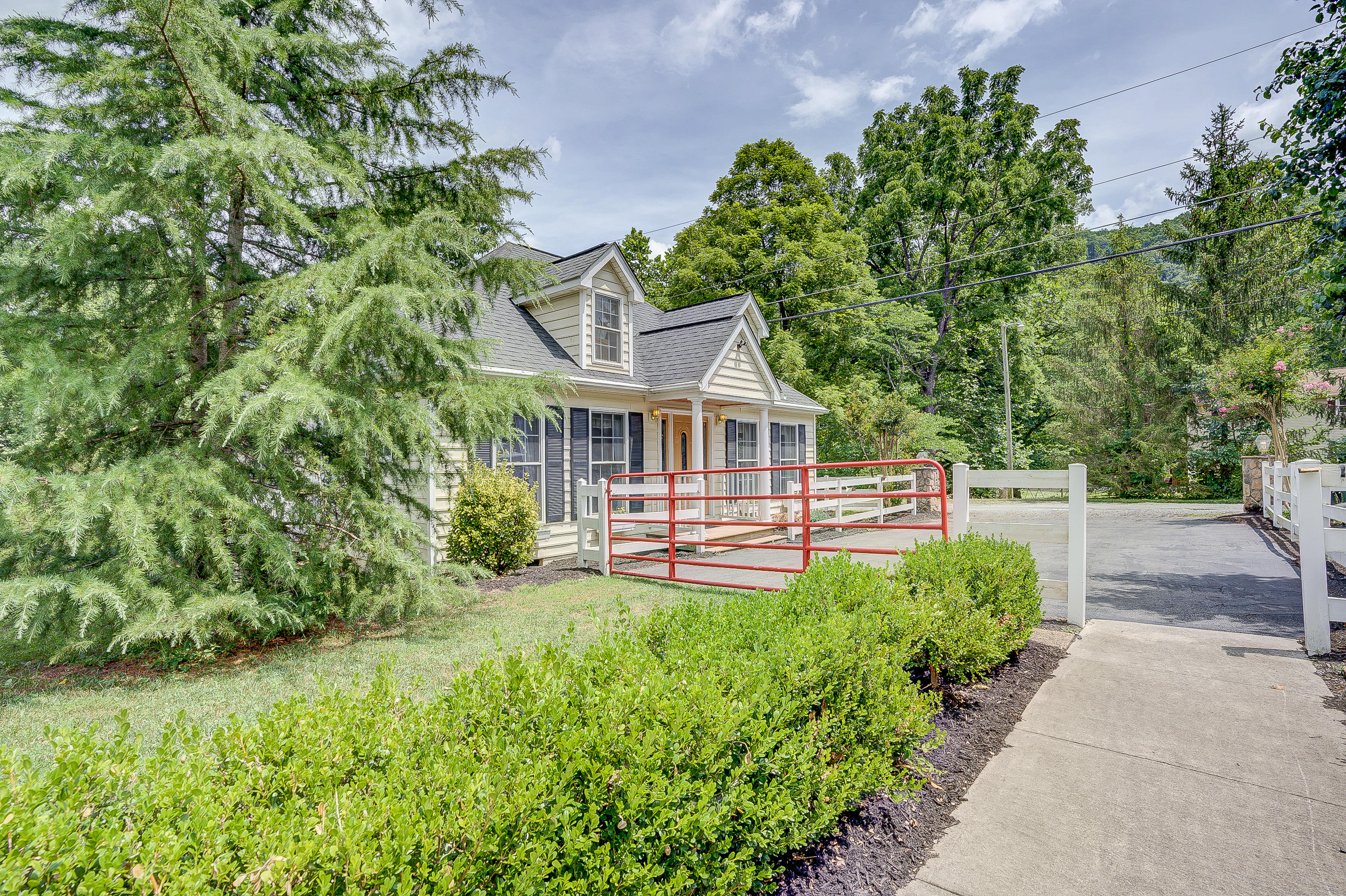105 River Road North Covington, VA 24426 - Photo 59 of 77 a front view of a house with a yard