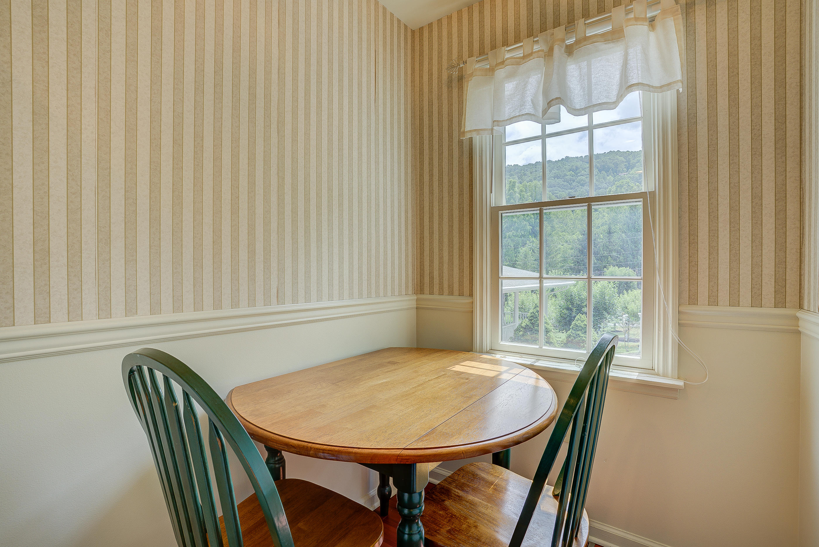 105 River Road North Covington, VA 24426 - Photo 73 of 77 a view of a dining room with furniture and a window