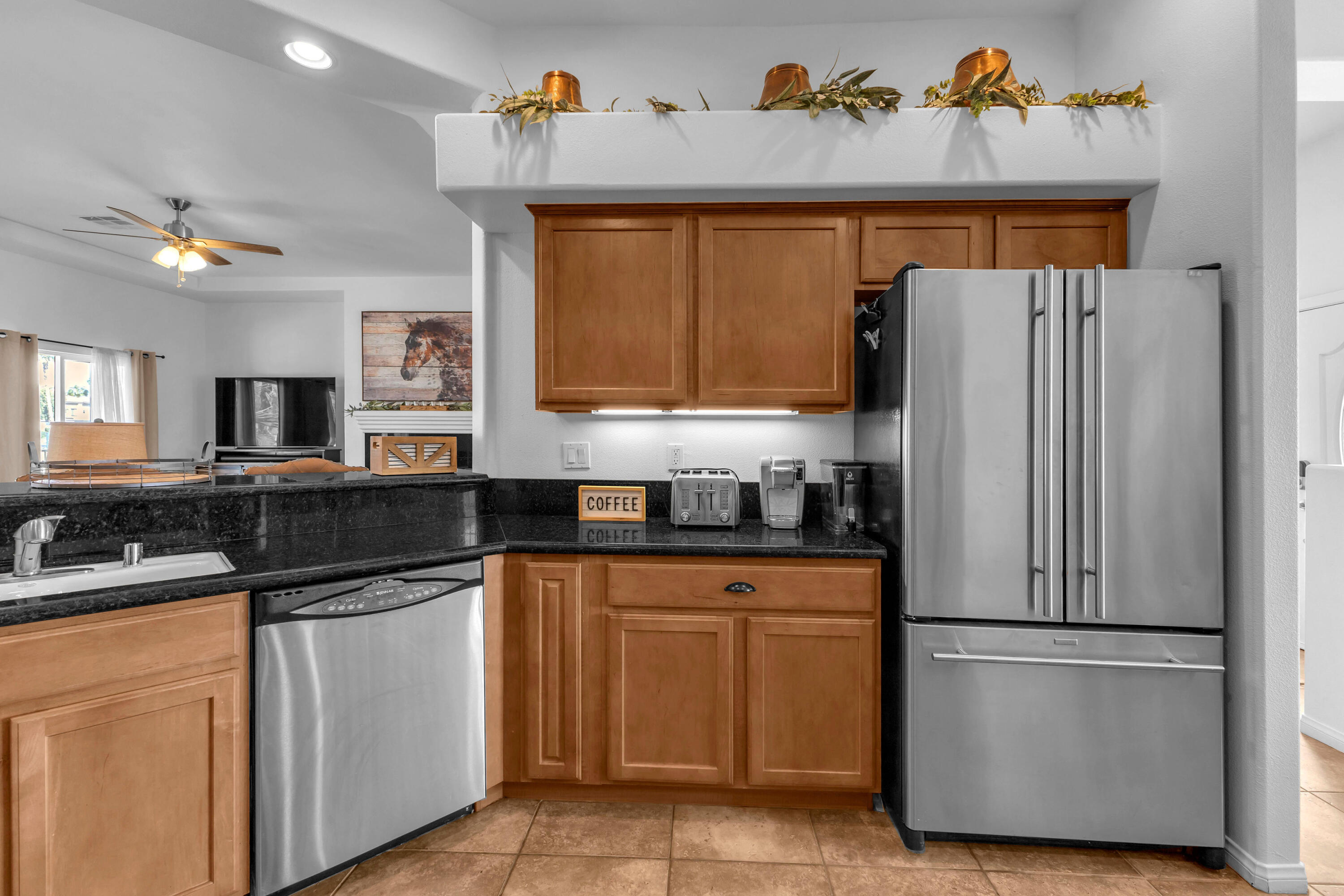 48305 Pic Way Indio, CA 92201 - Photo 16 of 77 a kitchen with appliances a sink and cabinets