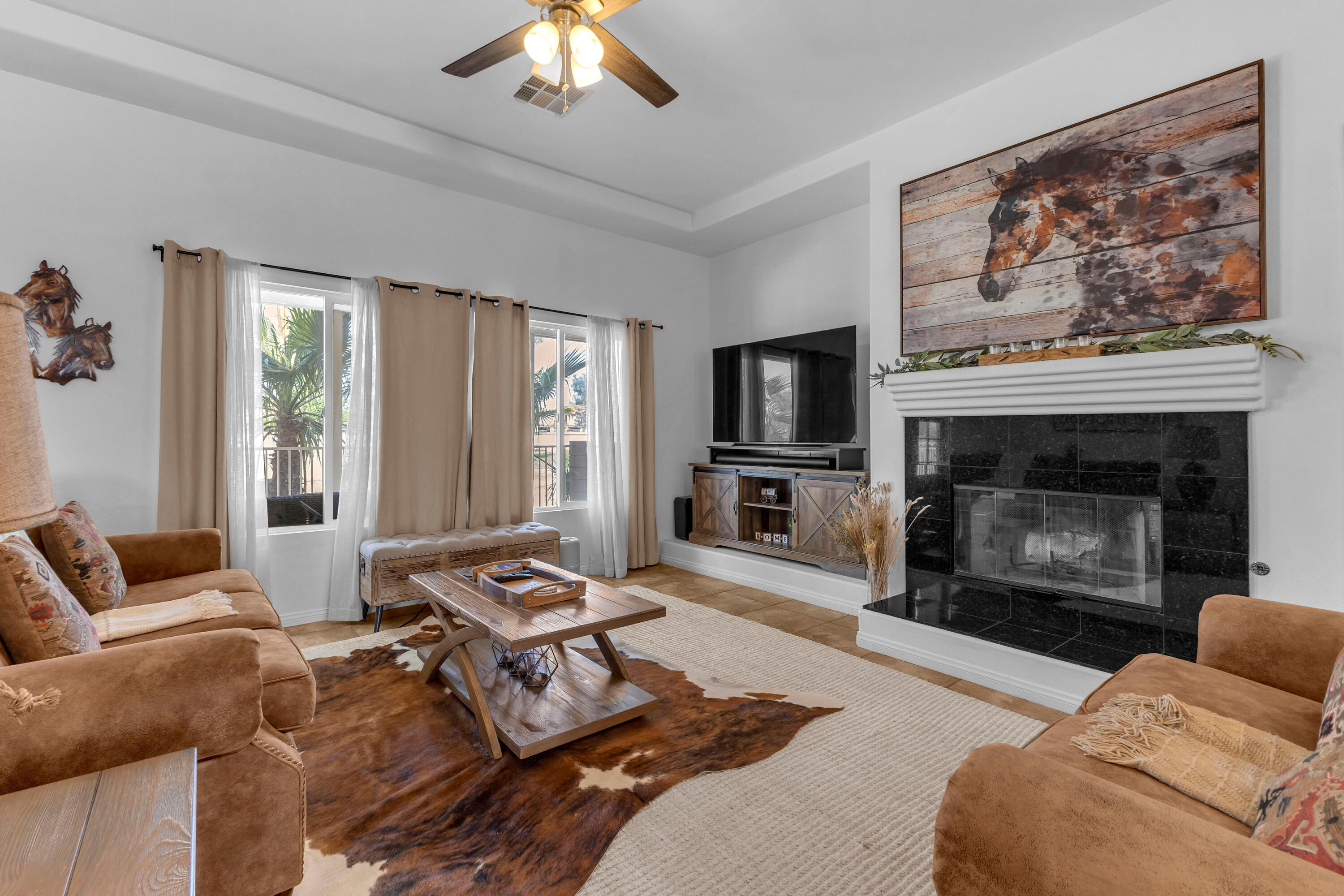 48305 Pic Way Indio, CA 92201 - Photo 24 of 77 a living room with furniture fireplace and flat screen tv