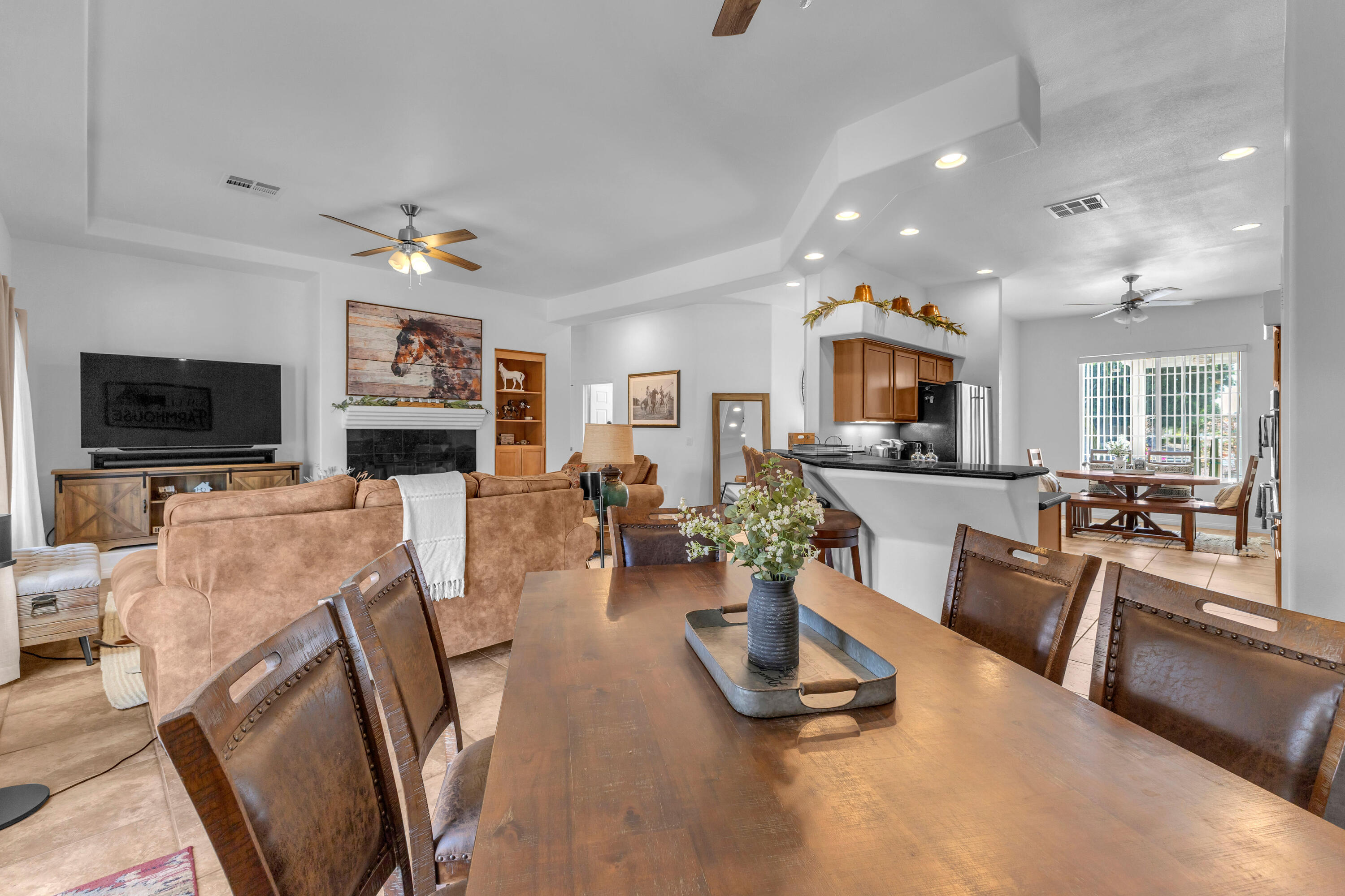 48305 Pic Way Indio, CA 92201 - Photo 28 of 77 a living room with furniture and a flat screen tv