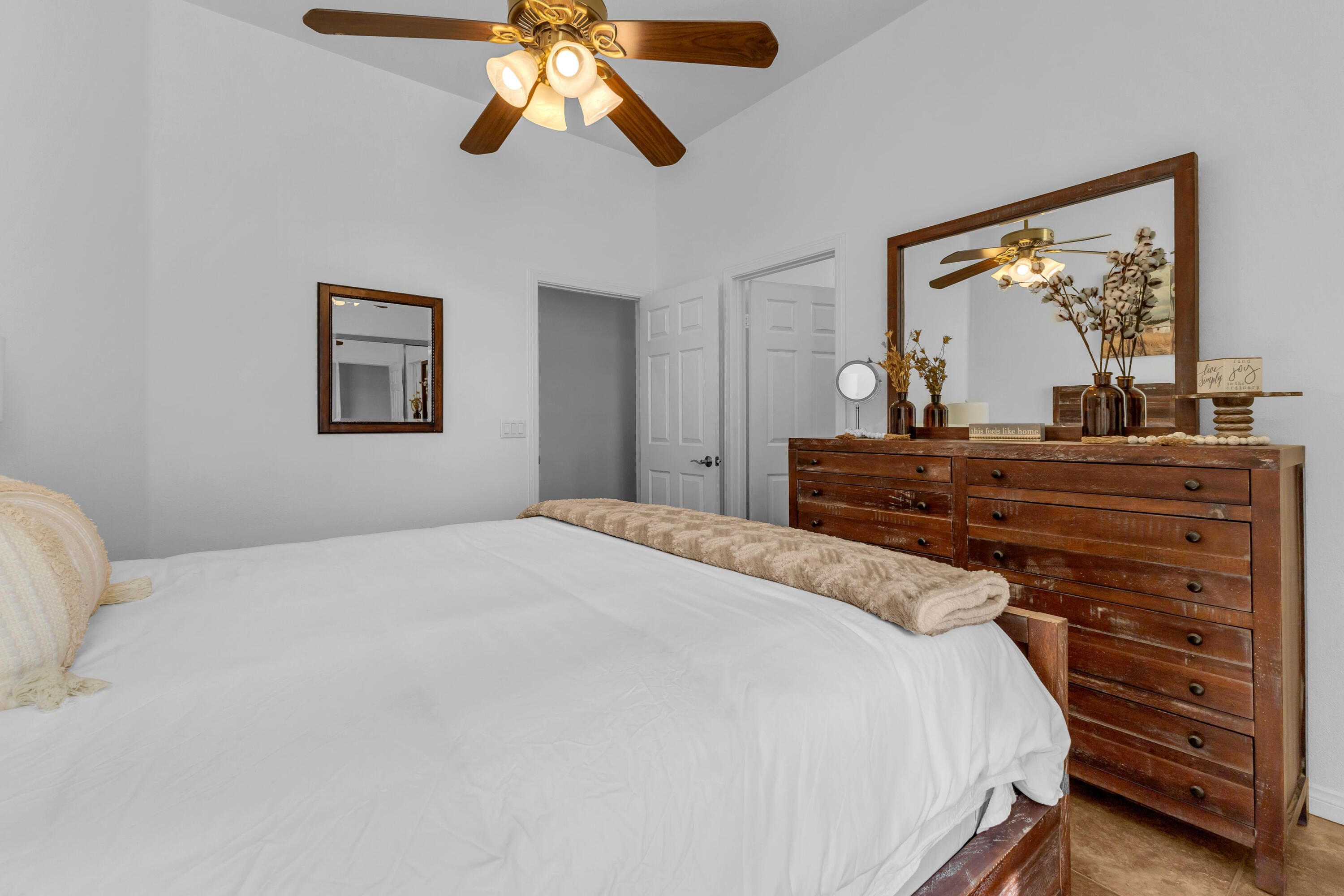 48305 Pic Way Indio, CA 92201 - Photo 38 of 77 a bedroom with a bed and a dresser