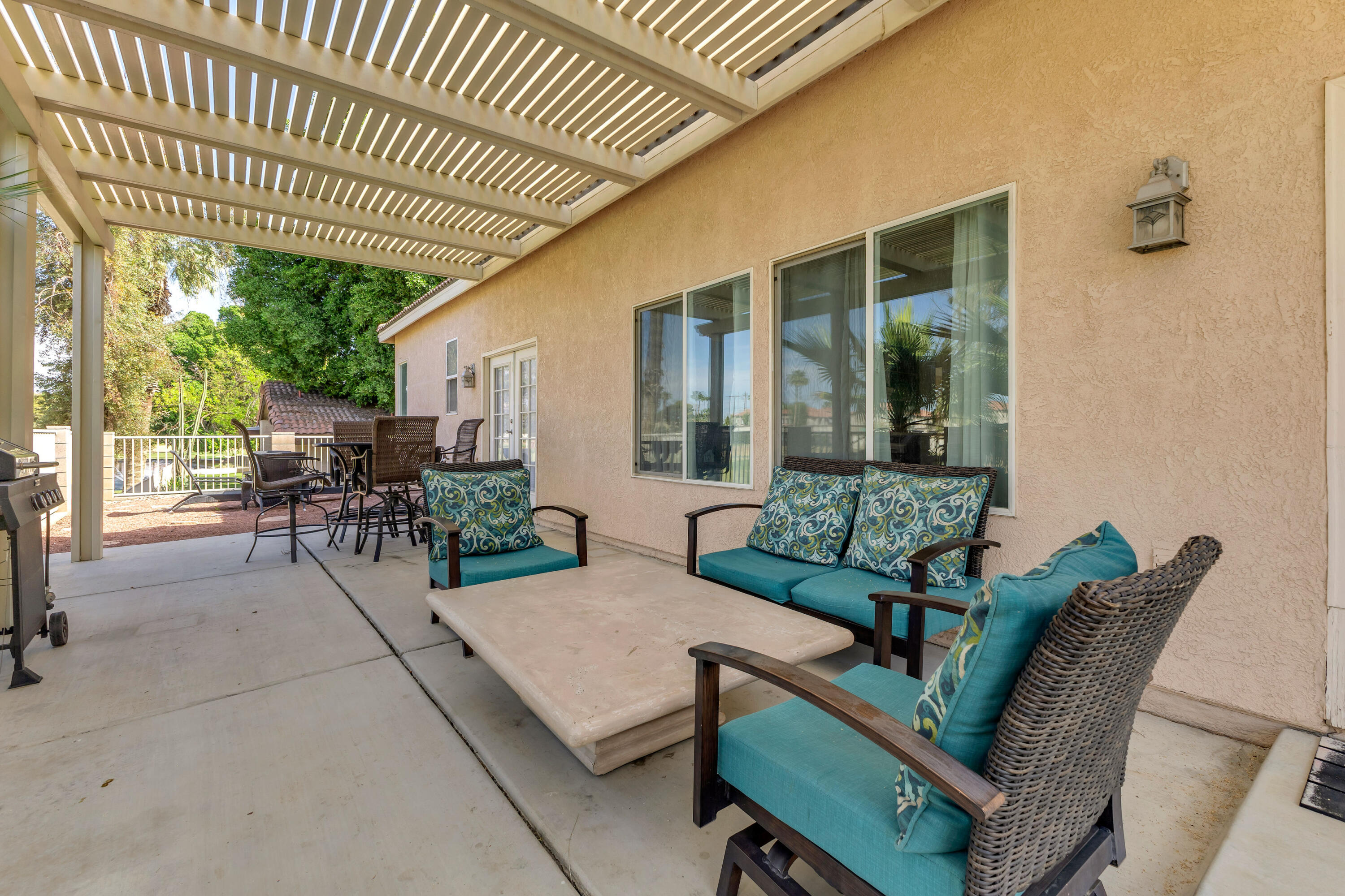 48305 Pic Way Indio, CA 92201 - Photo 54 of 77 a view of a house with backyard and sitting area