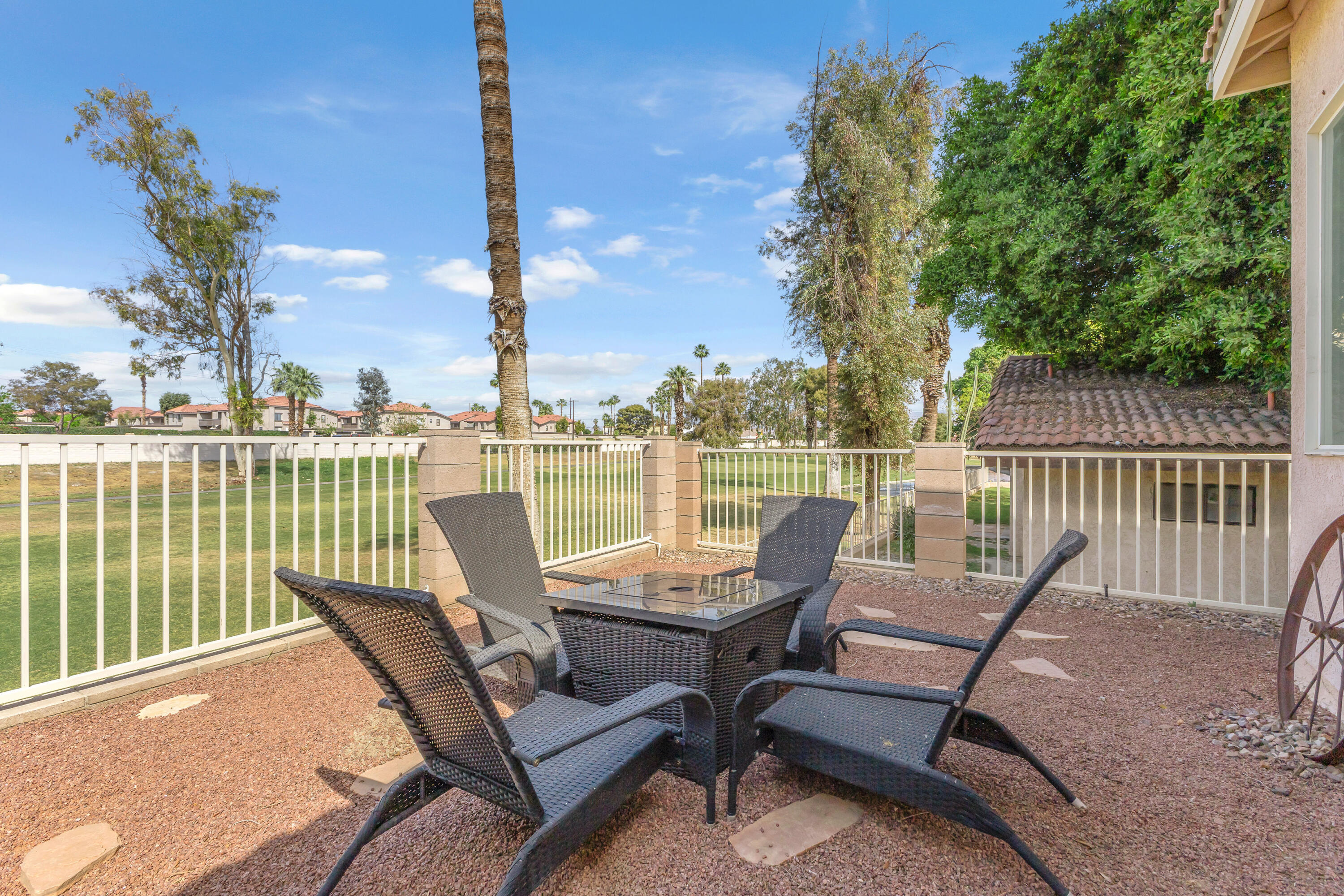 48305 Pic Way Indio, CA 92201 - Photo 58 of 77 a view of a patio with two chairs and a table