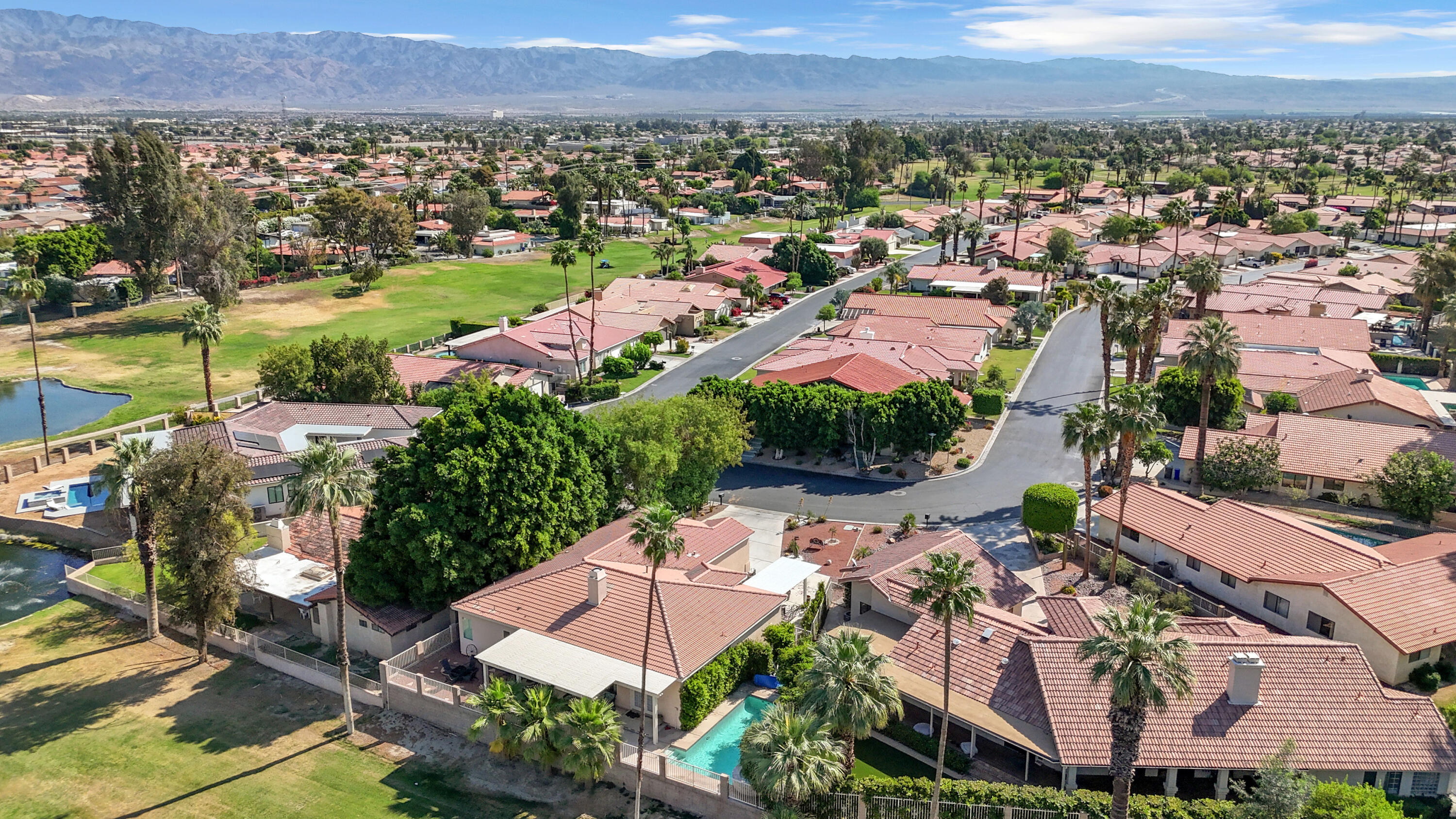 48305 Pic Way Indio, CA 92201 - Photo 63 of 77 an aerial view of residential houses with outdoor space