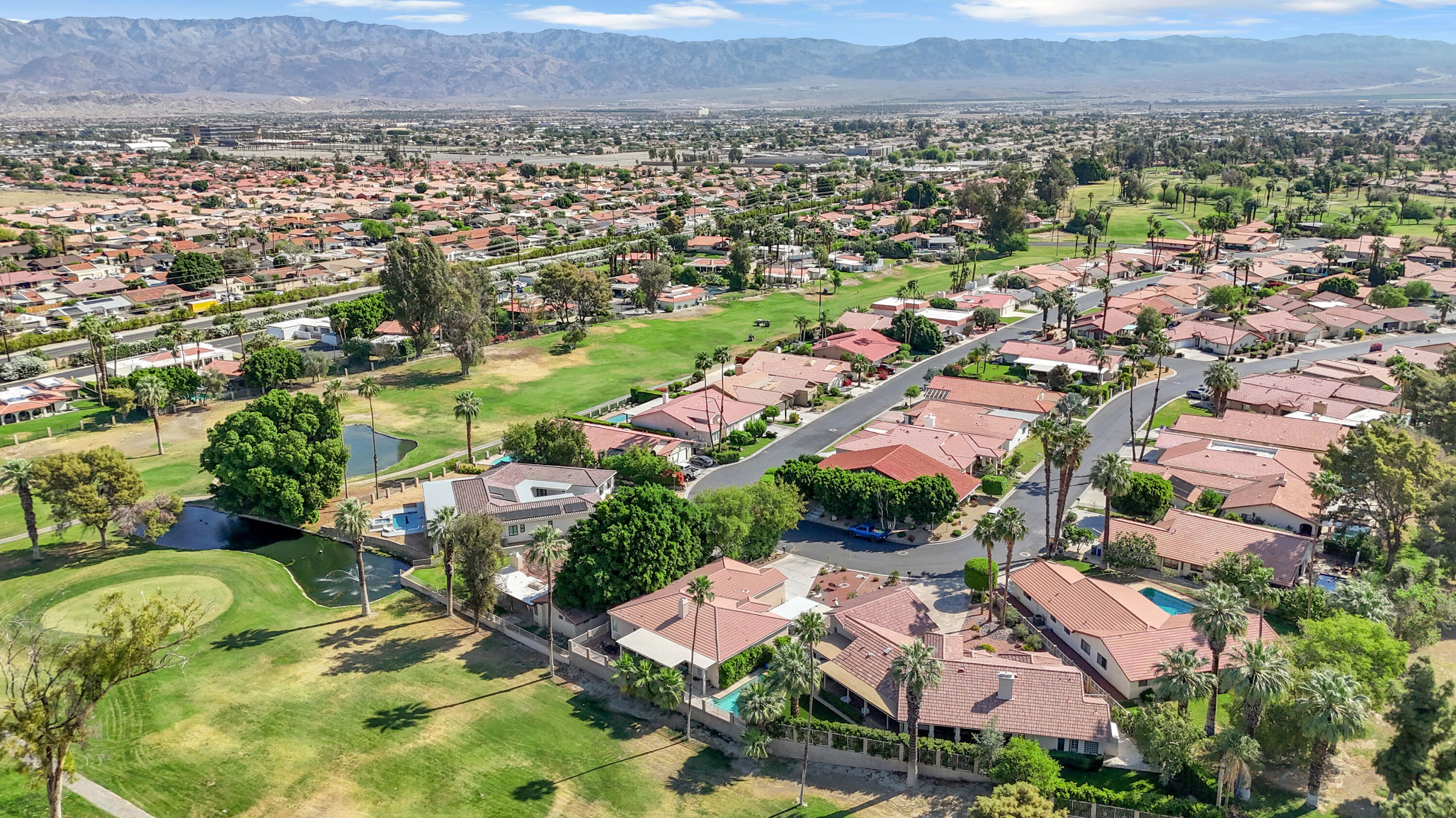 48305 Pic Way Indio, CA 92201 - Photo 68 of 77 an aerial view of residential houses with outdoor space