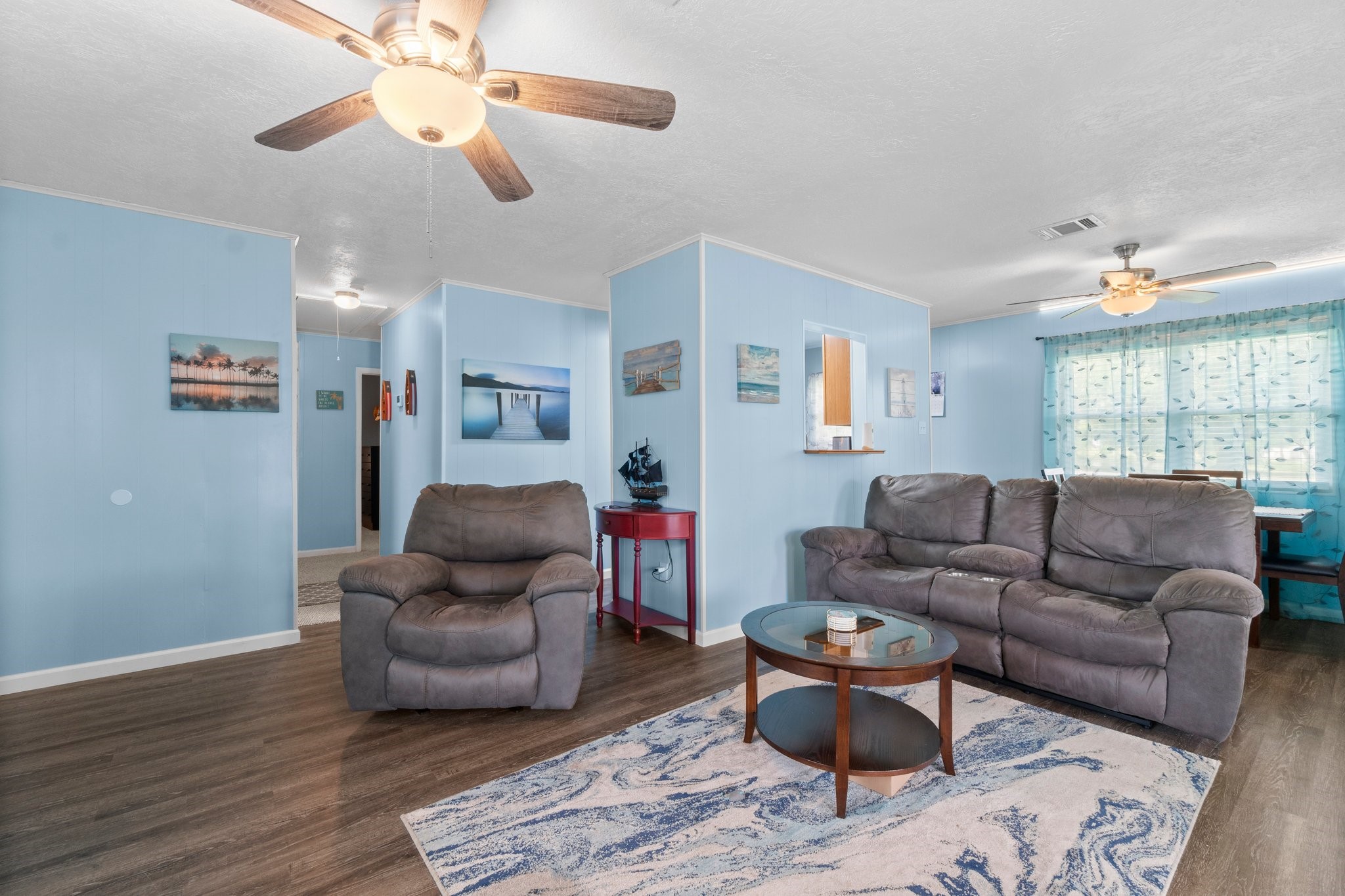 21 Clearview Point Blank, TX 77364 - Photo 14 of 43 a living room with furniture and a wooden floor