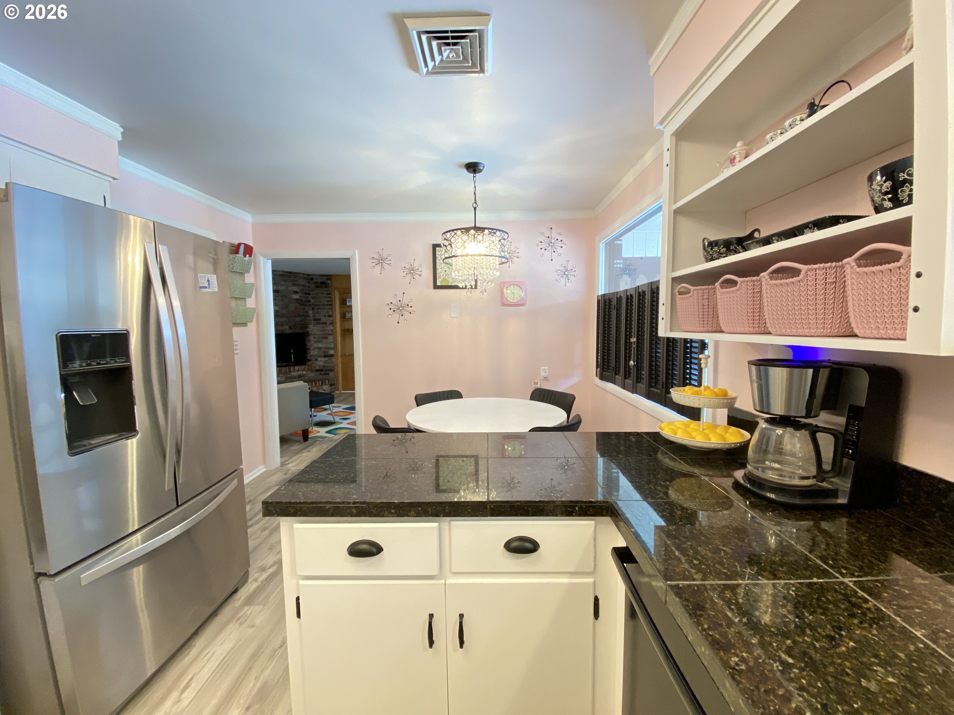 2872 Suffolk Court Eugene, OR 97401 - Photo 13 of 36 a kitchen with stainless steel appliances granite countertop a sink a stove and a refrigerator