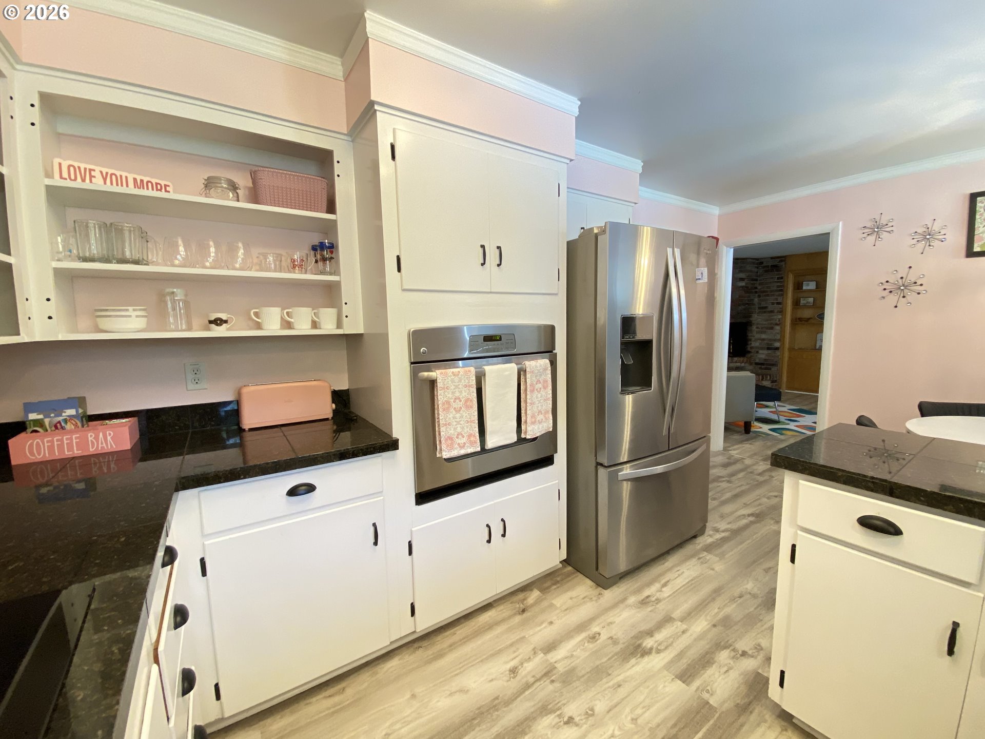 2872 Suffolk Court Eugene, OR 97401 - Photo 14 of 36 a kitchen with granite countertop a refrigerator and a stove
