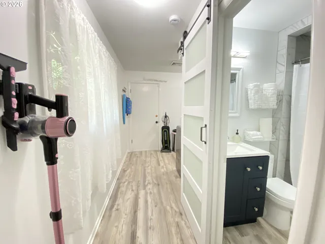 a bathroom with a sink and mirror
