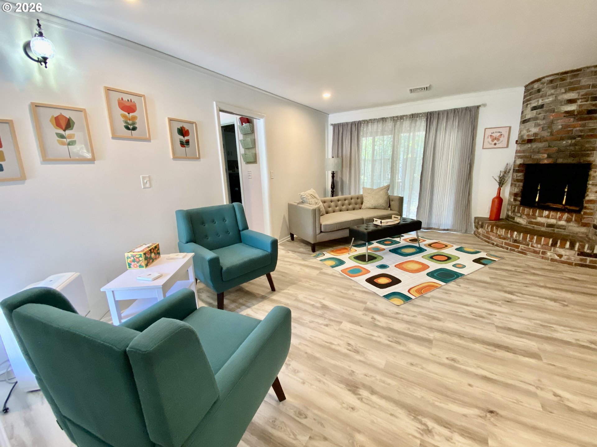 2872 Suffolk Court Eugene, OR 97401 - Photo 5 of 36 a living room with furniture and a flat screen tv