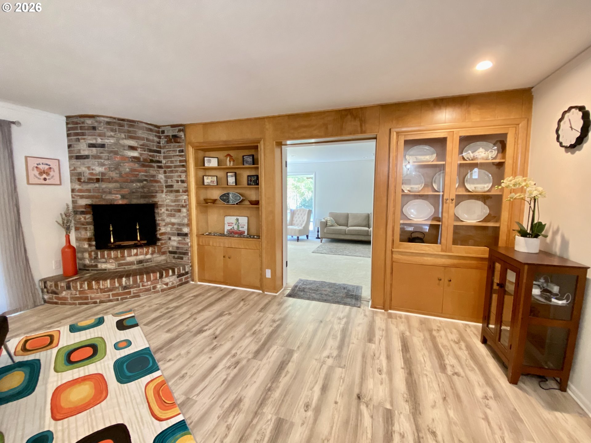 2872 Suffolk Court Eugene, OR 97401 - Photo 7 of 36 a view of an empty room with furniture and a fireplace
