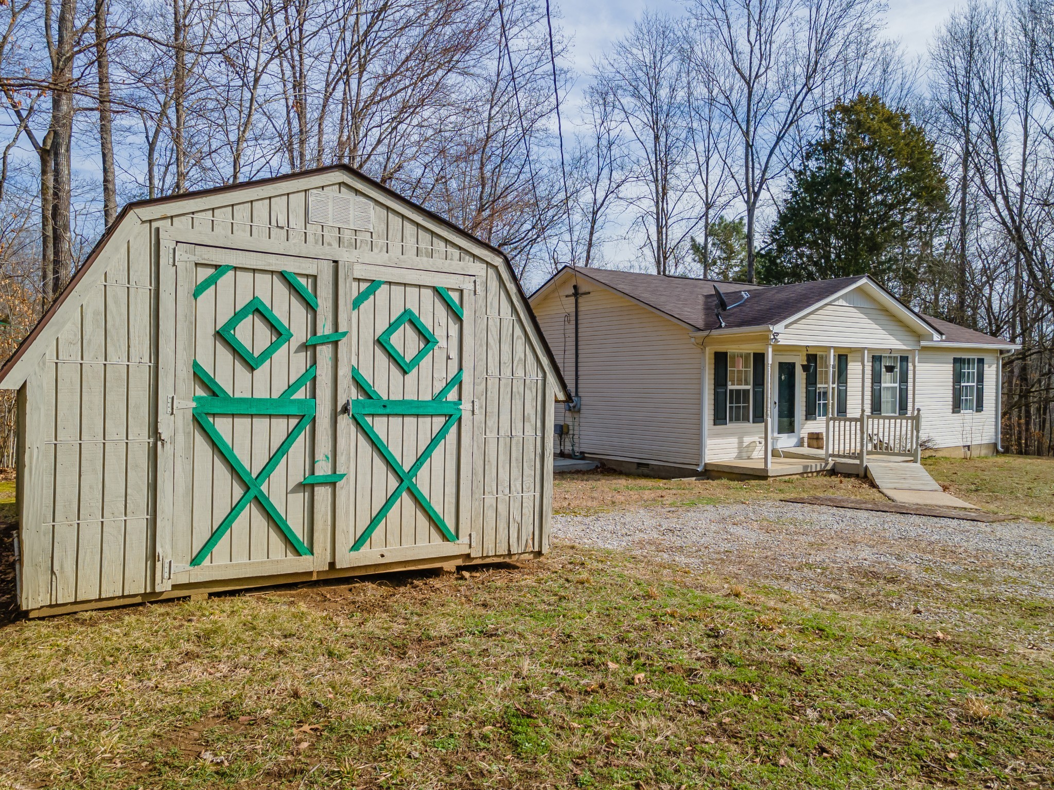 2640 Winding Way Road Culleoka, TN 38451 - Photo 11 of 51 a front view of a house with garden