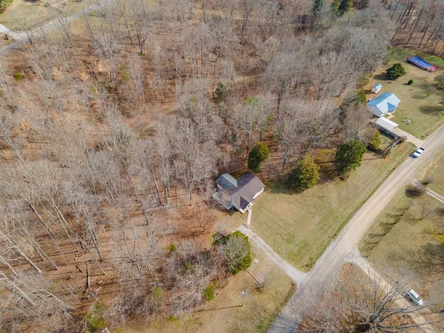 a view of a backyard of a house