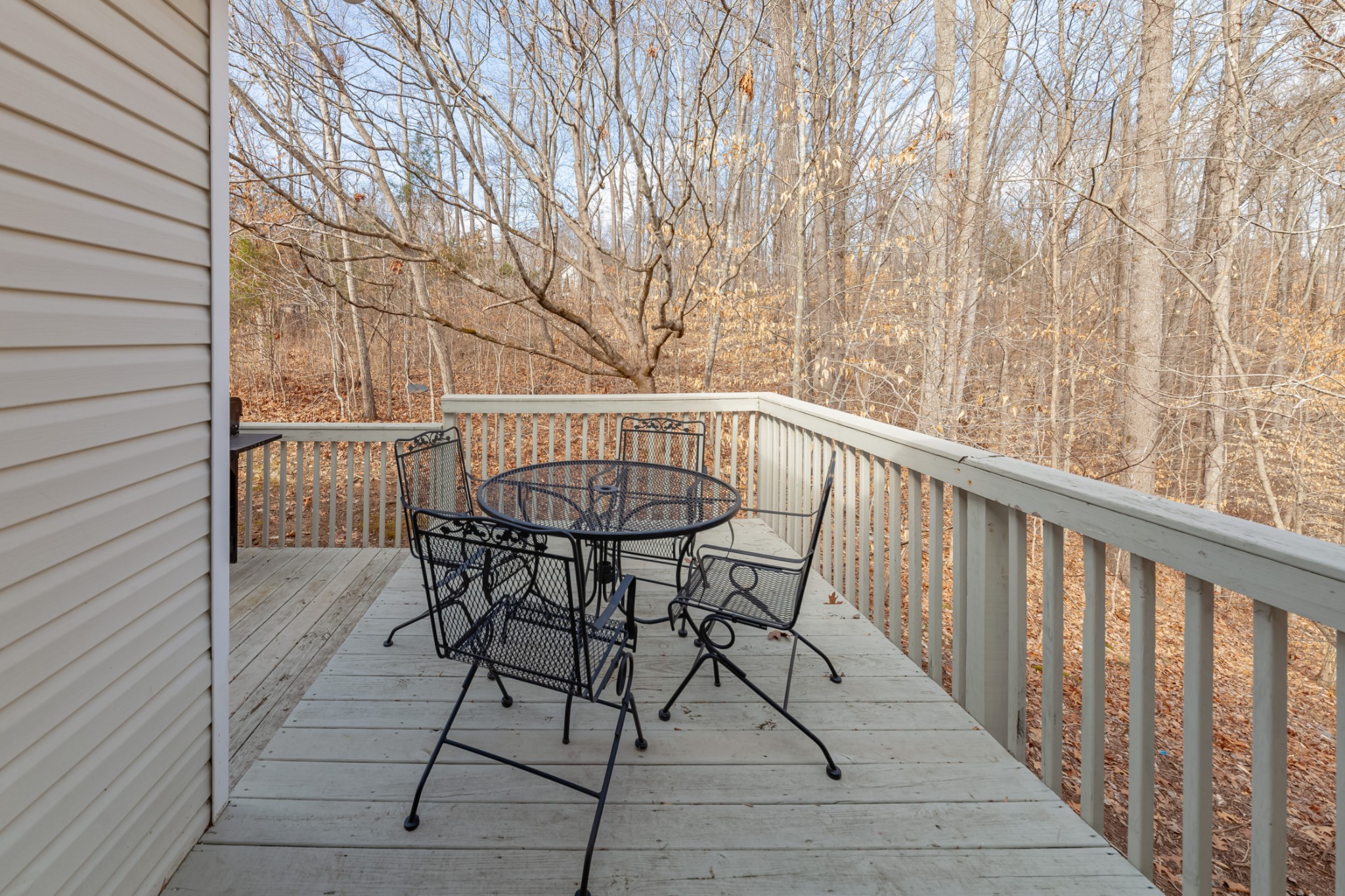 2640 Winding Way Road Culleoka, TN 38451 - Photo 27 of 51 a view of a chairs and table on the balcony