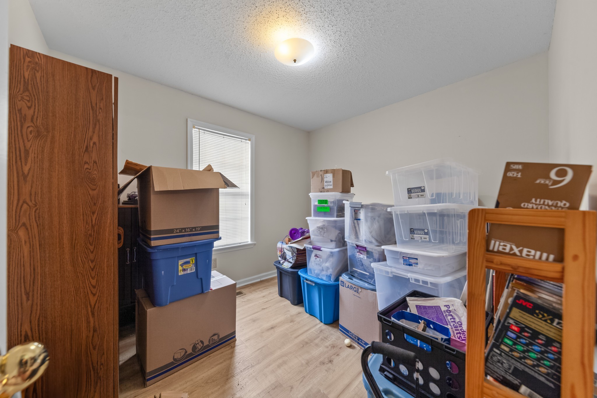 2640 Winding Way Road Culleoka, TN 38451 - Photo 43 of 51 a bedroom with furniture and a book shelf
