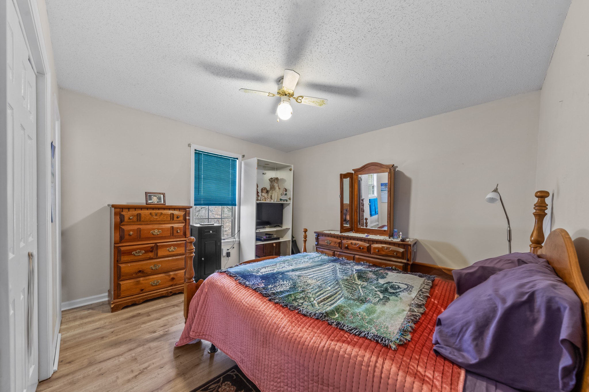 2640 Winding Way Road Culleoka, TN 38451 - Photo 44 of 51 a bedroom with a bed and wooden floor