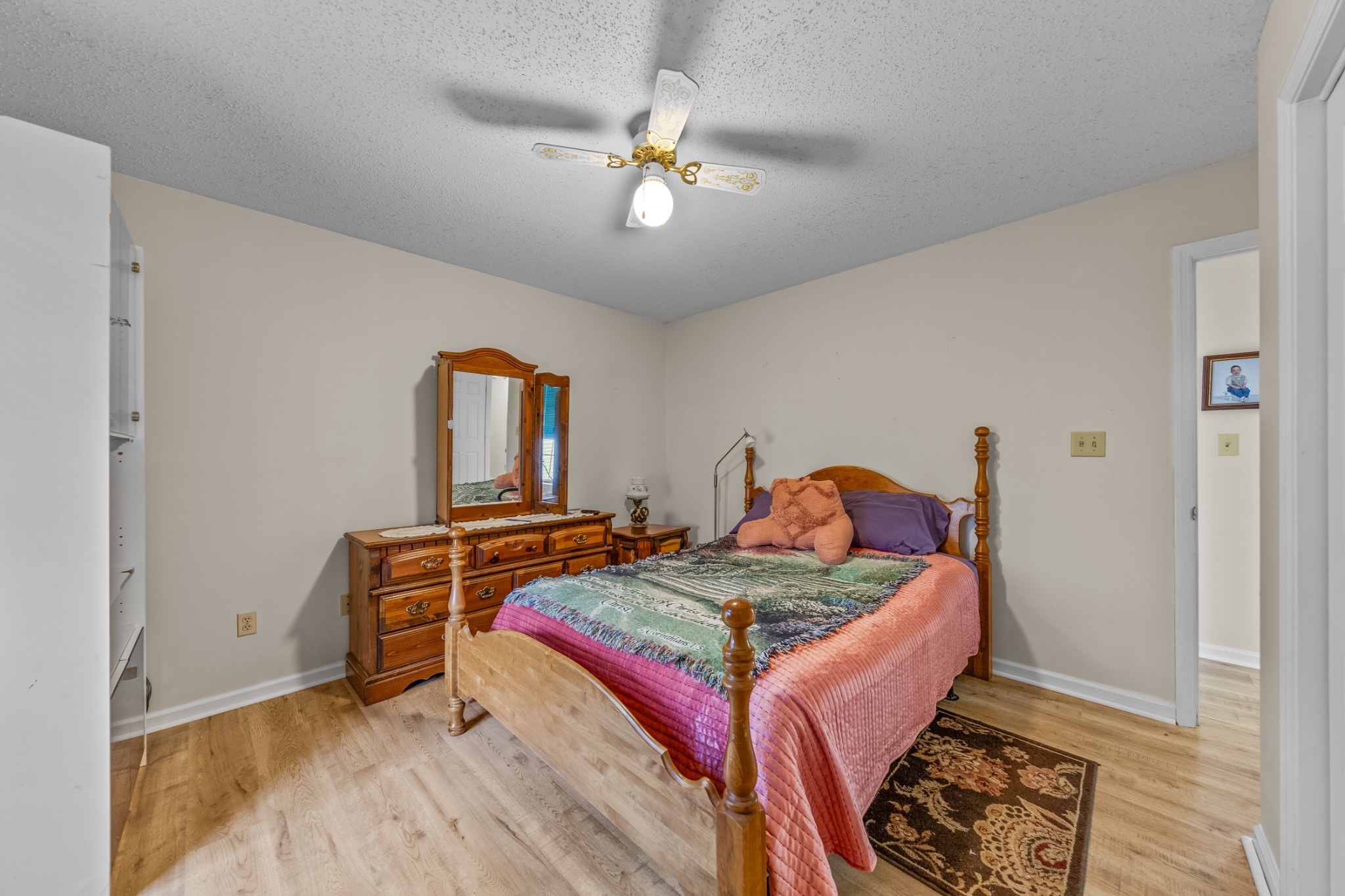 2640 Winding Way Road Culleoka, TN 38451 - Photo 45 of 51 a room with a bed and a chandelier