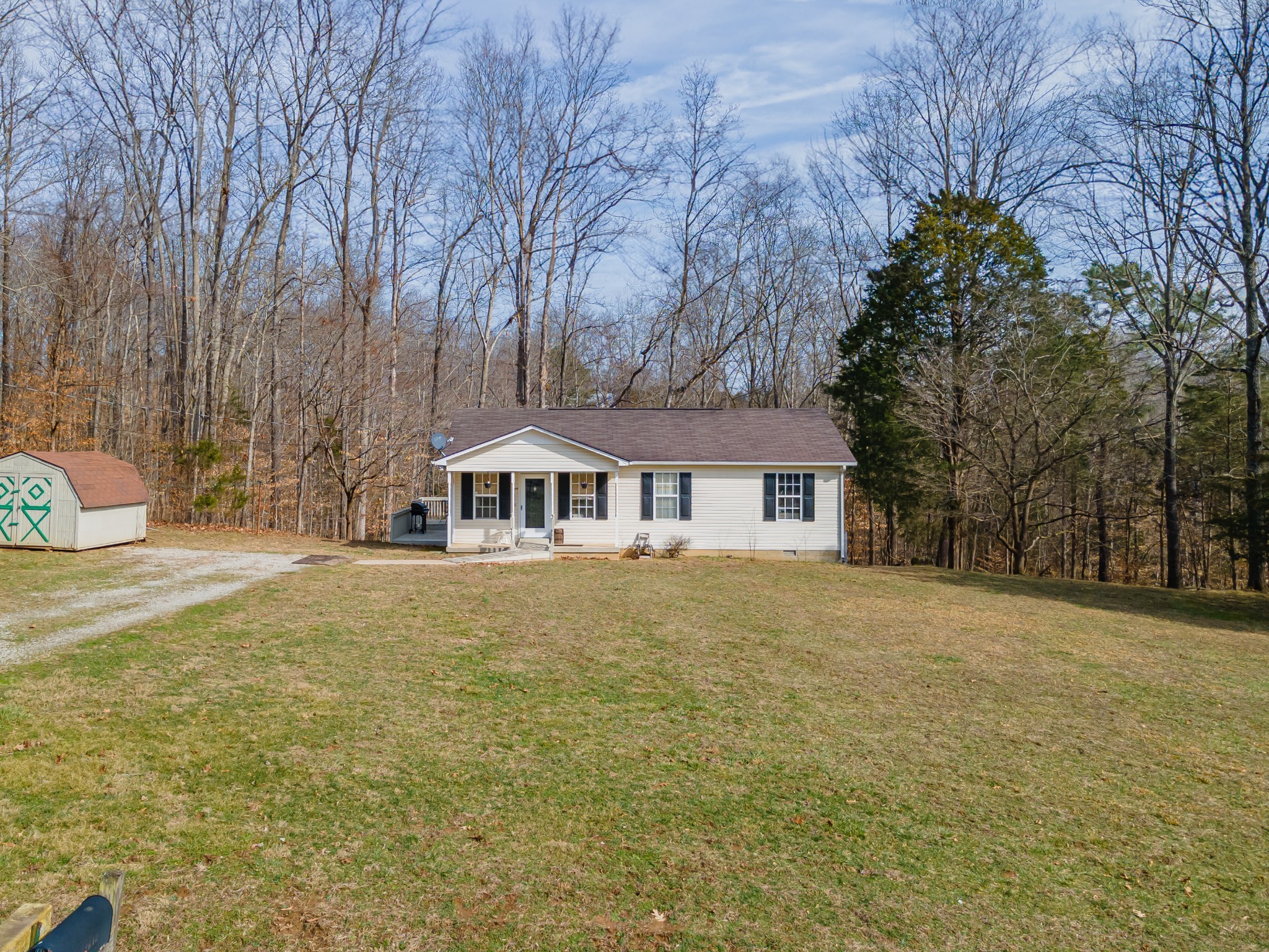 2640 Winding Way Road Culleoka, TN 38451 - Photo 7 of 51 a front view of a house with a garden