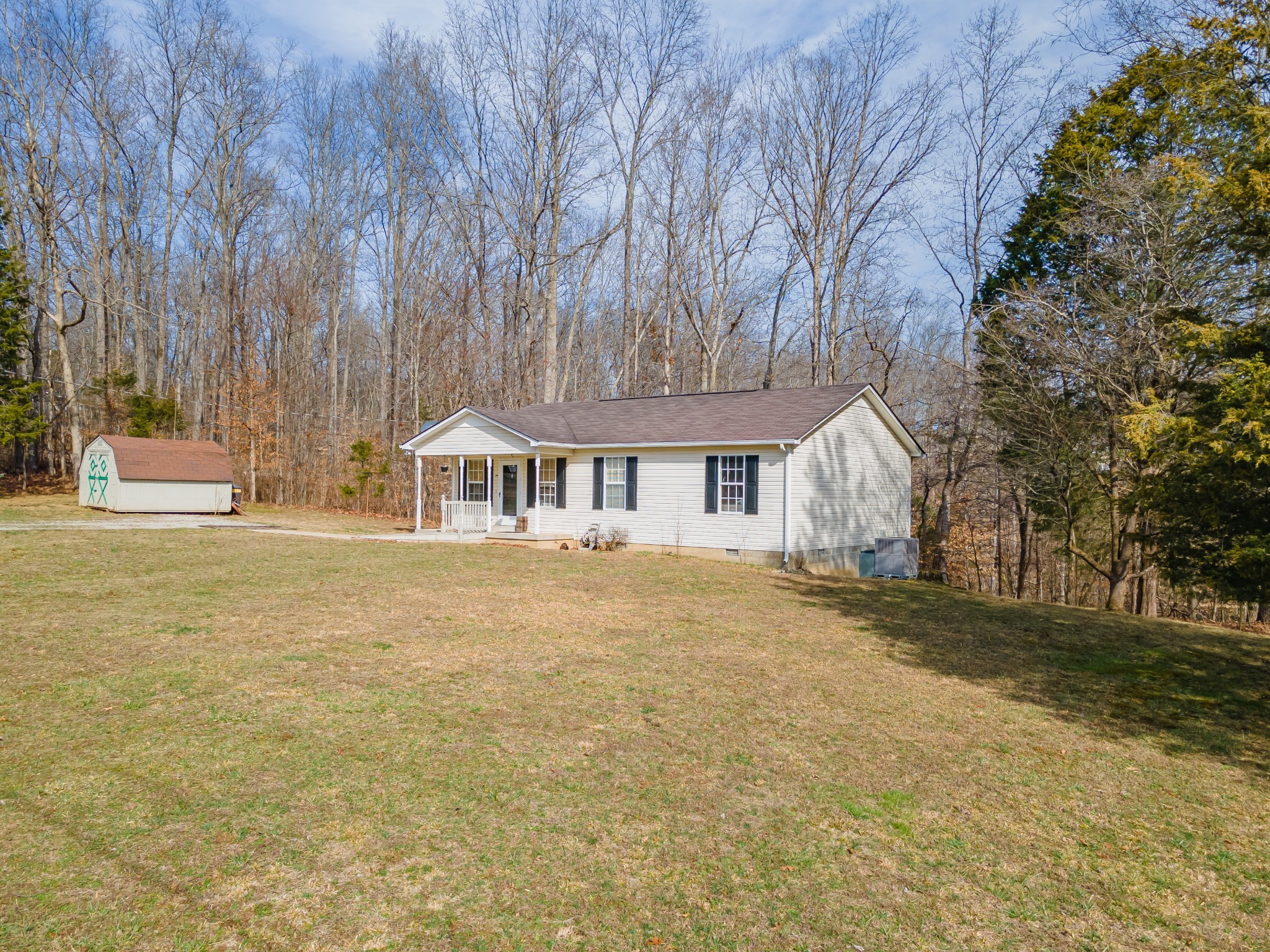 2640 Winding Way Road Culleoka, TN 38451 - Photo 9 of 51 a front view of a house with a garden