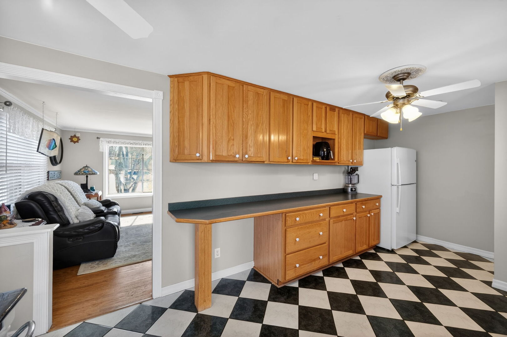 407 Butterfield Road North Aurora, IL 60542 - Photo 13 of 50 a kitchen with stainless steel appliances a sink a stove a refrigerator and cabinets