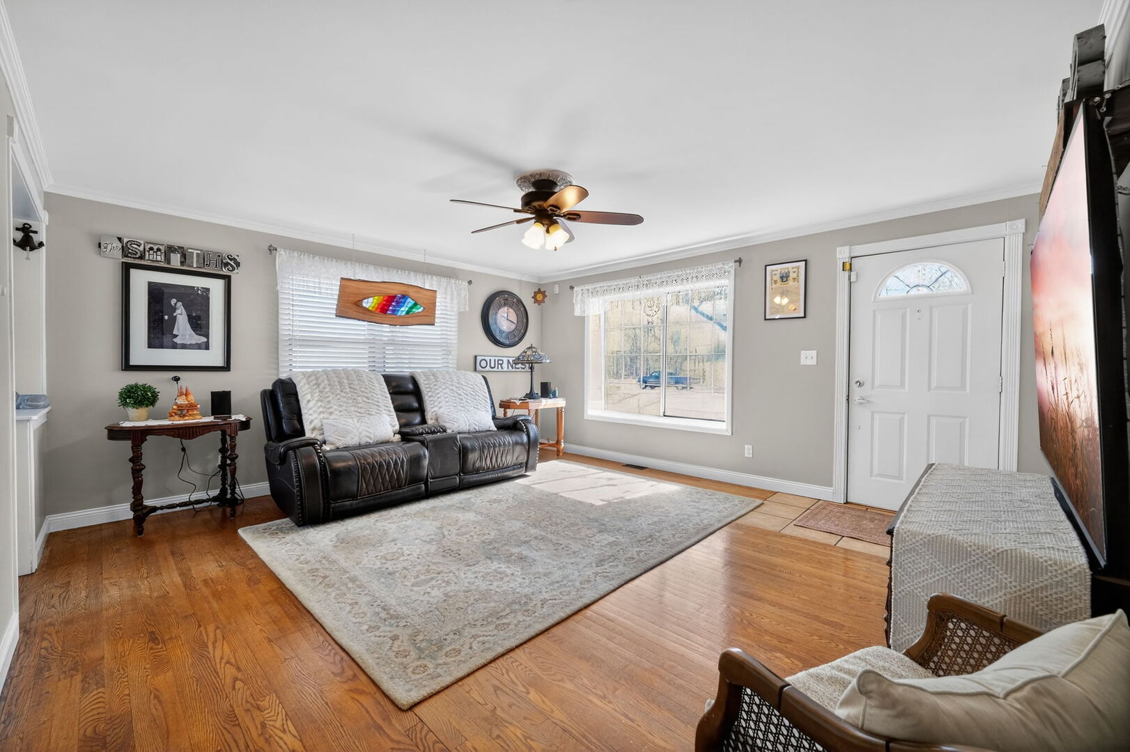 407 Butterfield Road North Aurora, IL 60542 - Photo 14 of 50 a living room with furniture and a large window