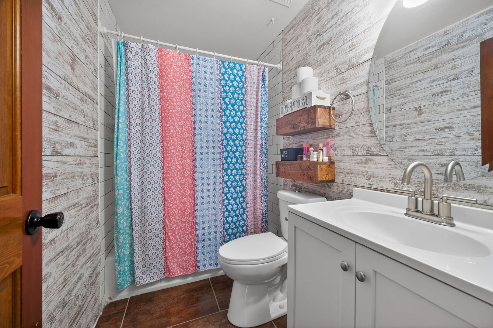 407 Butterfield Road North Aurora, IL 60542 - Photo 17 of 50 a bathroom with a sink a toilet and shower curtain