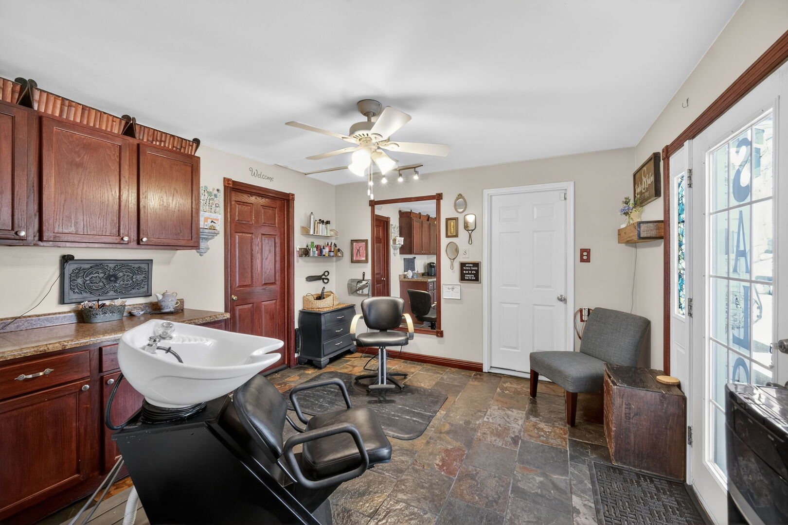 407 Butterfield Road North Aurora, IL 60542 - Photo 21 of 50 a view of a workspace with furniture and a livingroom