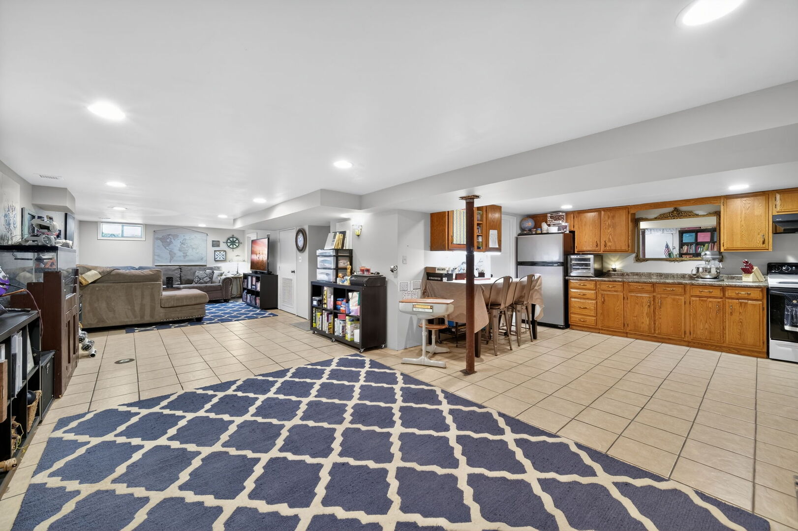 407 Butterfield Road North Aurora, IL 60542 - Photo 25 of 50 a lobby with furniture and view of kitchen