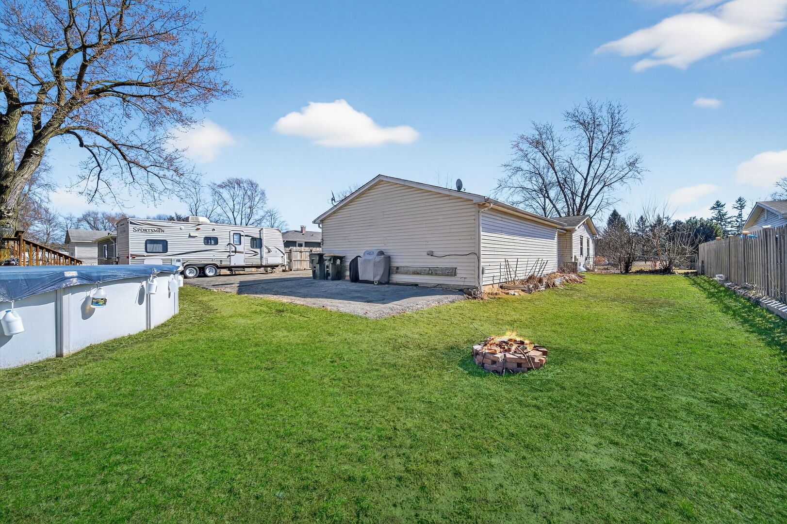 407 Butterfield Road North Aurora, IL 60542 - Photo 43 of 50 a house view with a sitting space and garden view