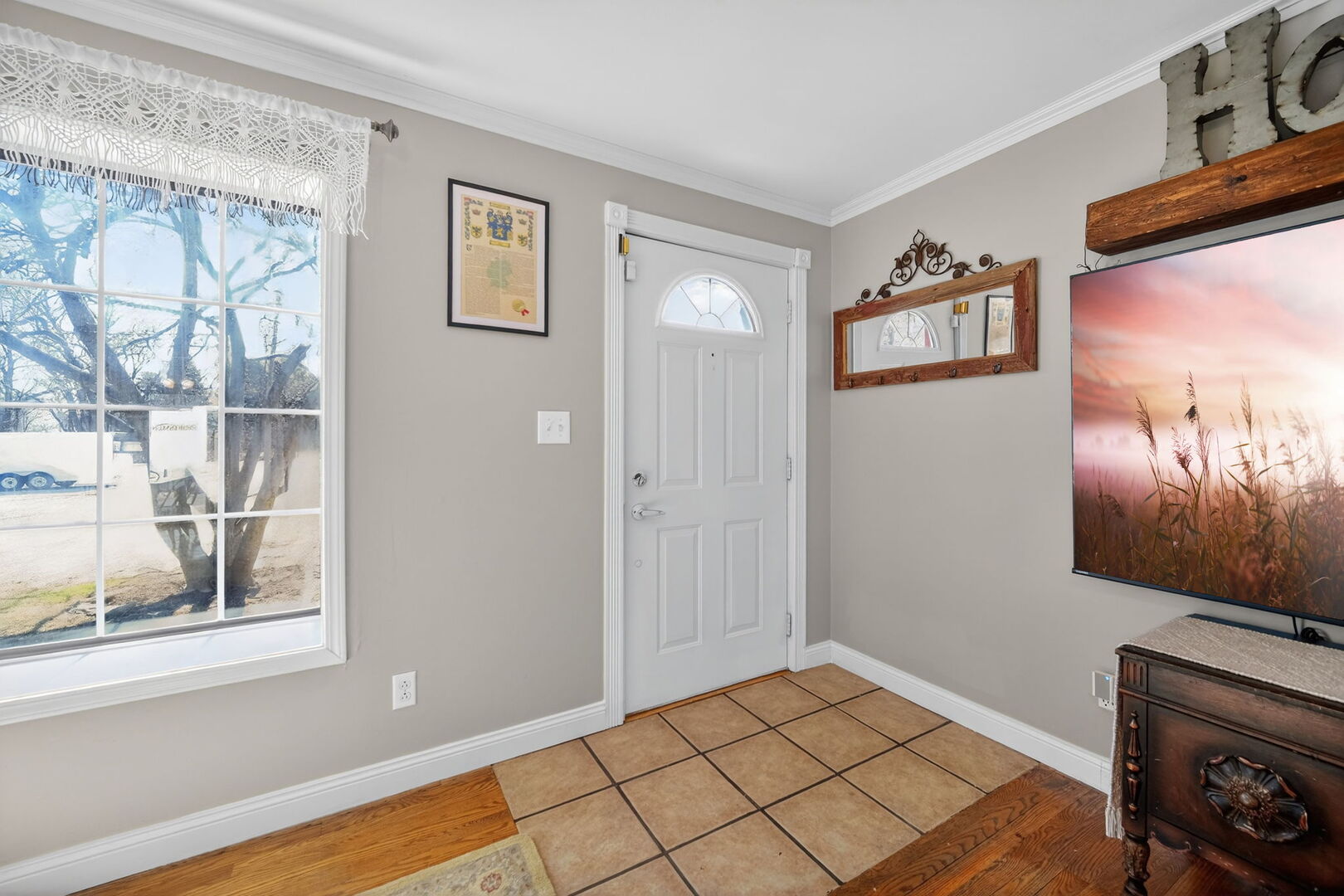 407 Butterfield Road North Aurora, IL 60542 - Photo 6 of 50 a bedroom with a bed and a flat screen tv