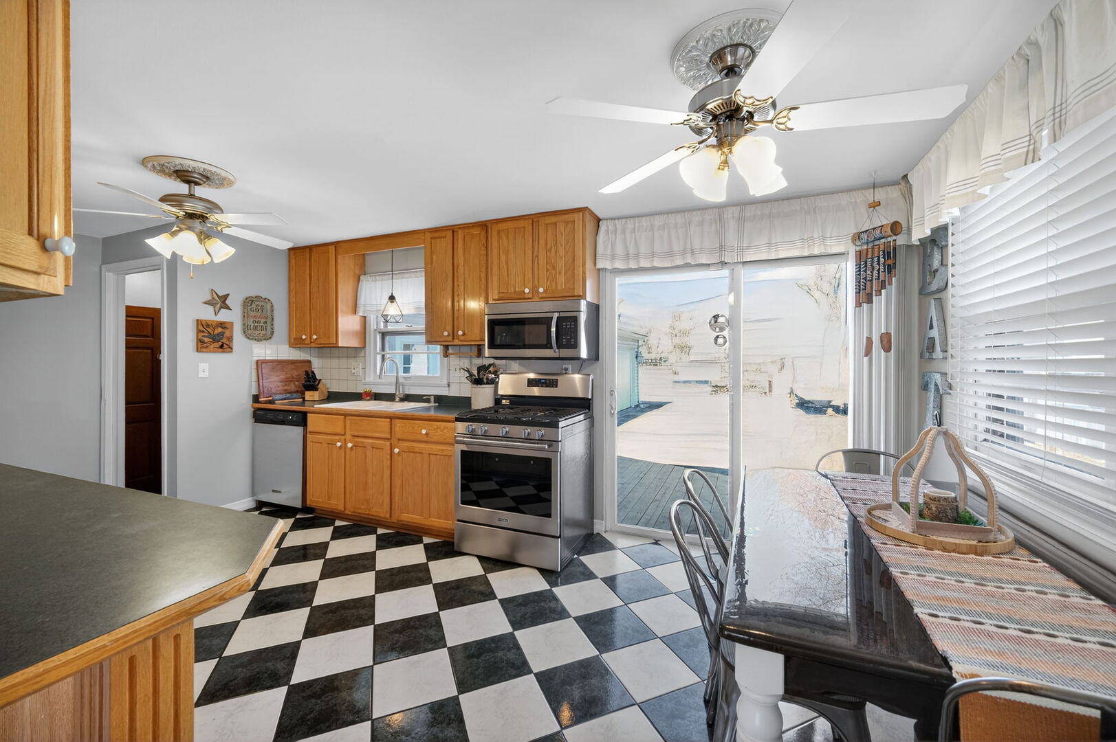 407 Butterfield Road North Aurora, IL 60542 - Photo 8 of 50 a kitchen with a refrigerator a sink and a stove