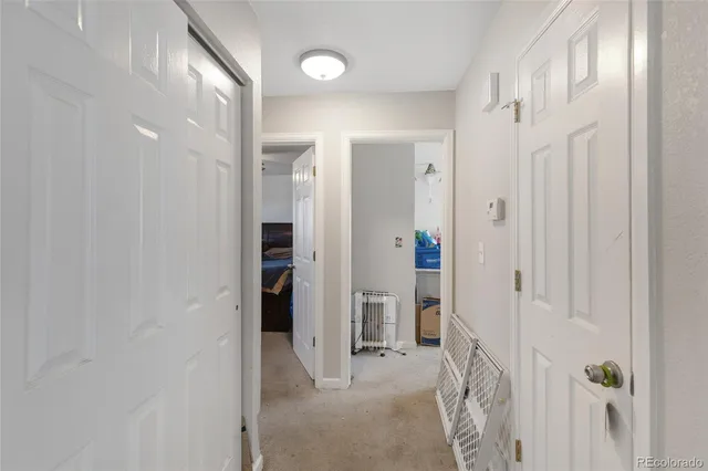 a view of a bathroom from a hallway