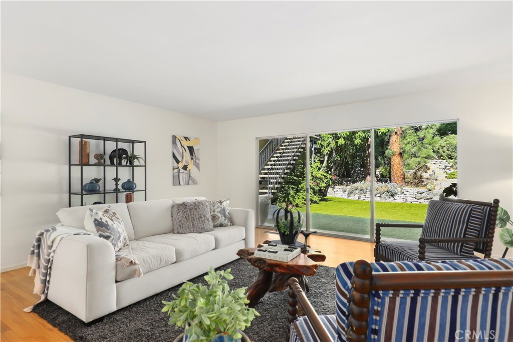 1237 Olive Lane La Canada Flintridge, CA 91011 - Photo 11 of 57 a living room with furniture and a large window