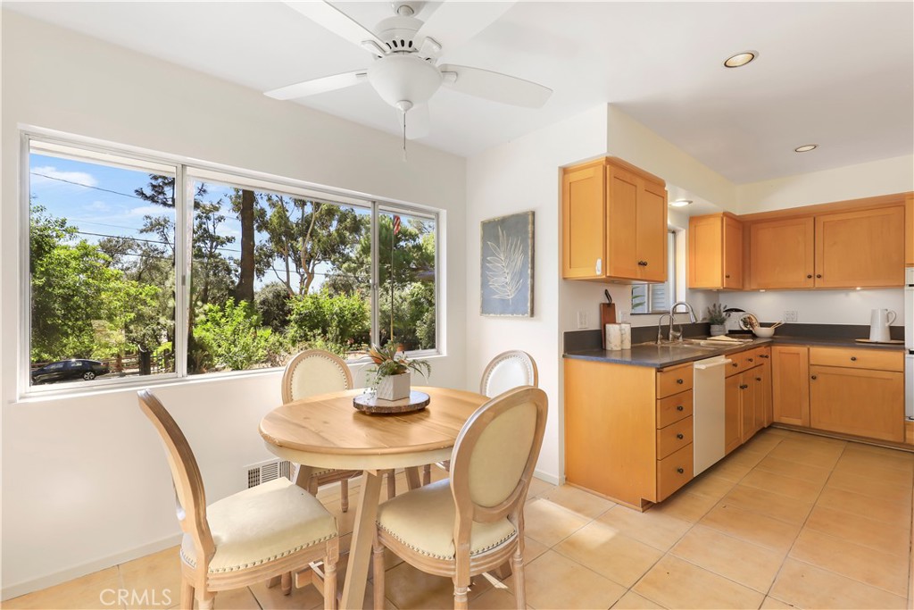 1237 Olive Lane La Canada Flintridge, CA 91011 - Photo 23 of 57 a kitchen with a table chairs and microwave