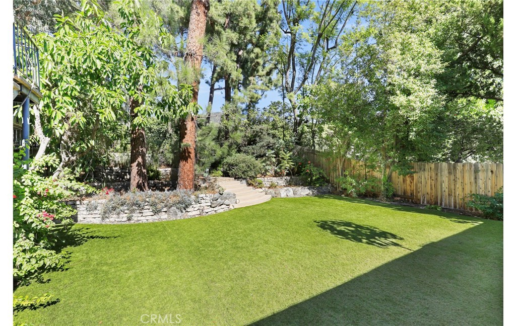 1237 Olive Lane La Canada Flintridge, CA 91011 - Photo 30 of 57 a view of a backyard with large trees