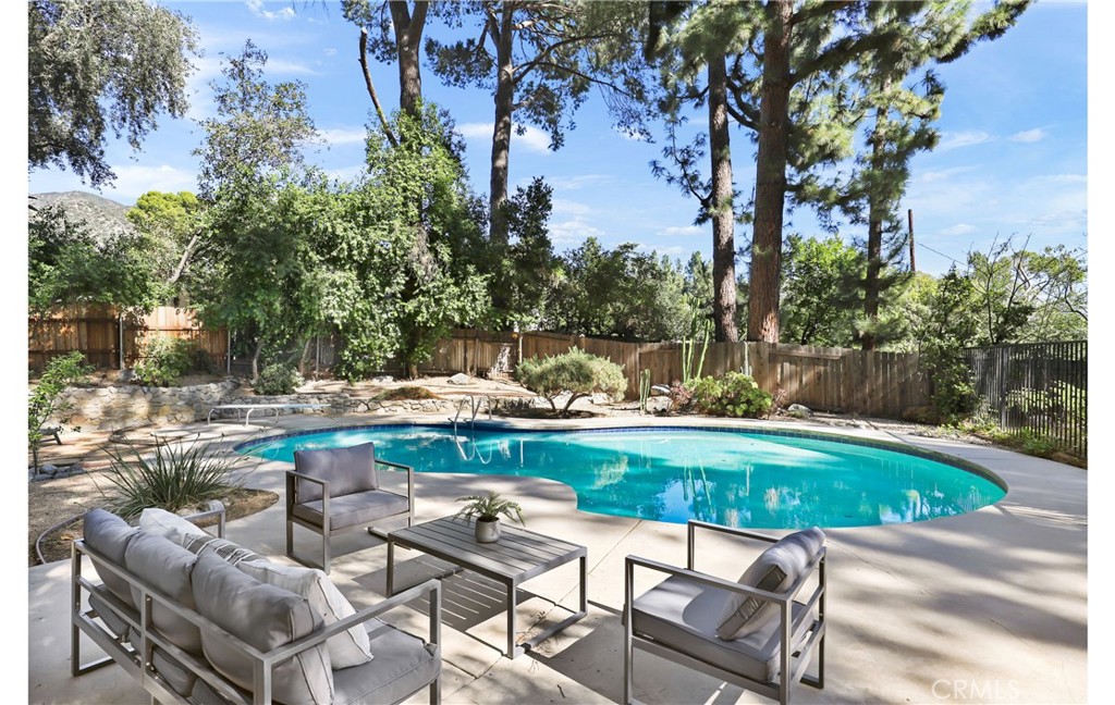 1237 Olive Lane La Canada Flintridge, CA 91011 - Photo 35 of 57 a view of swimming pool with lawn chairs and plants