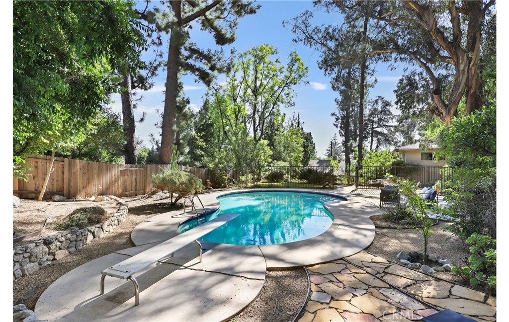 1237 Olive Lane La Canada Flintridge, CA 91011 - Photo 37 of 57 a view of a swimming pool with lounge chair